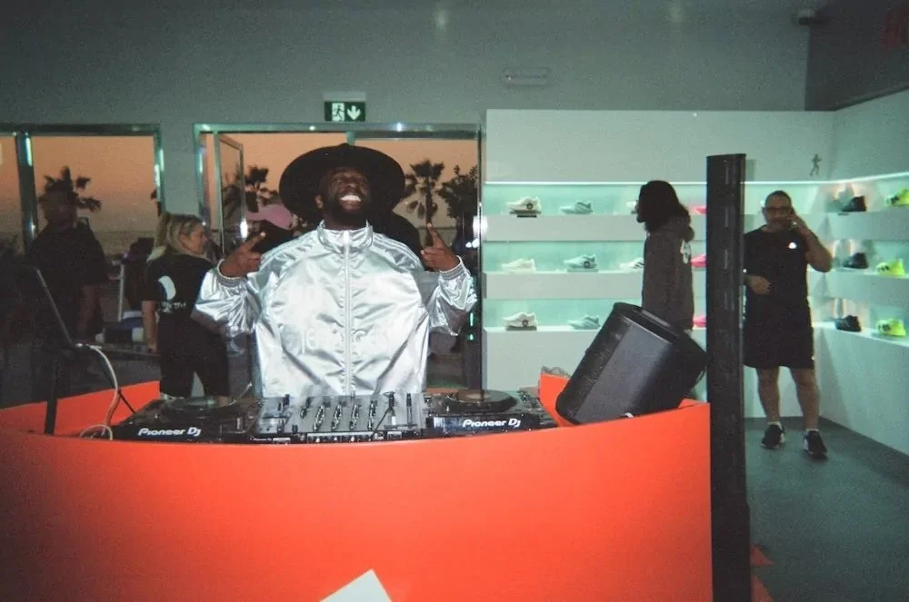 DJ poses for a photo at Adidas Running Hub in Dubai