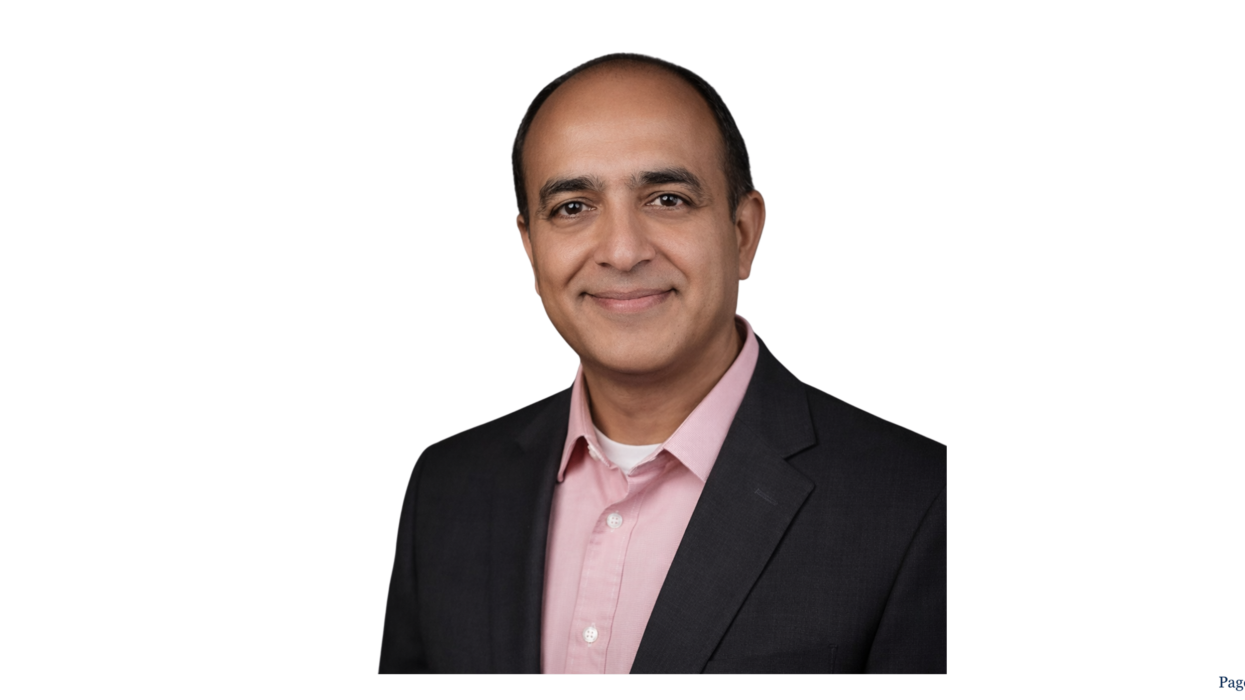 Headshot of a smiling man in a black suit and pink shirt against a black background. Venkat Thummisi