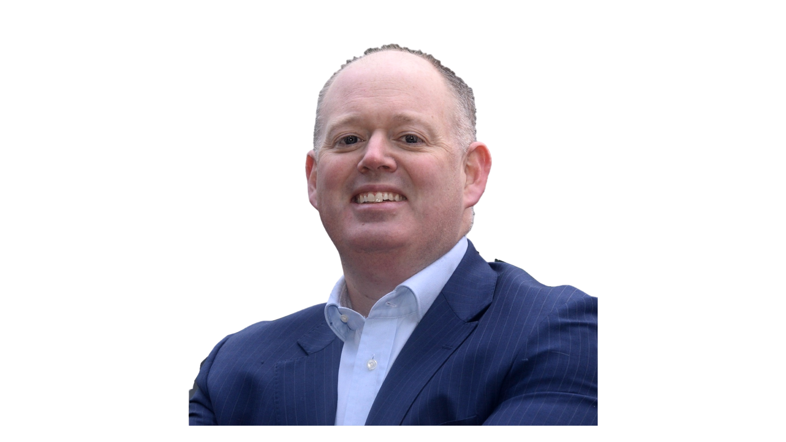 A man in a navy blue pinstripe suit and white dress shirt smiling with his arms crossed. Joe McCaffrey