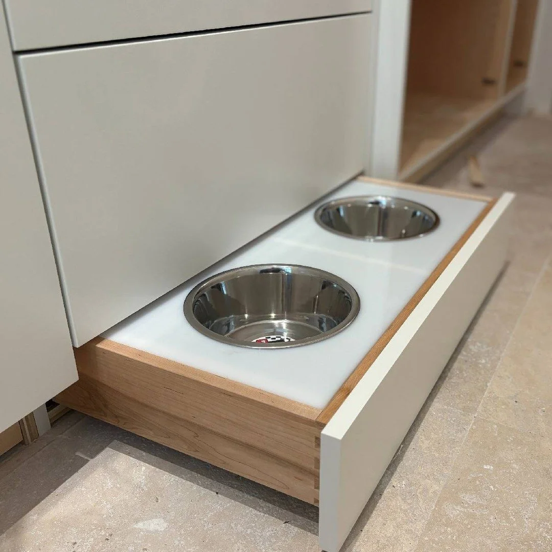 Luxury for the whole family &mdash; including the four-legged ones. 🐾
This custom pull-out pet feeding station blends seamlessly into the cabinetry while adding everyday convenience and cleanliness.

Thoughtful design. Precision craftsmanship.

Serv
