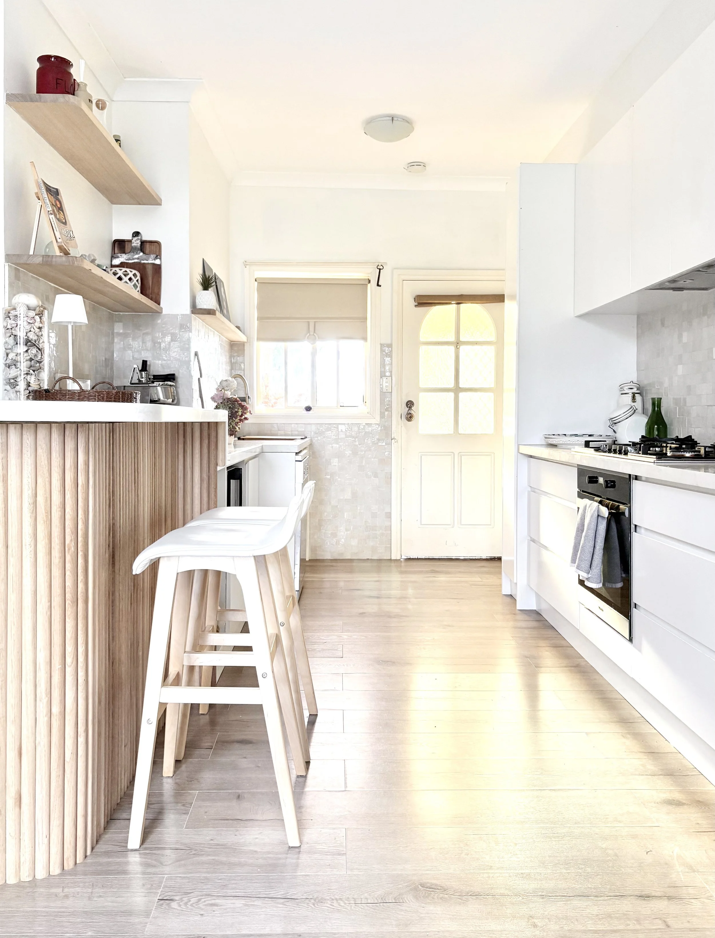 Full kitchen renovation

Featuring Moroccan hand-painted splash-back tiles, Tasmanian oak detailing, and a custom bench-top with a raised breakfast bar.