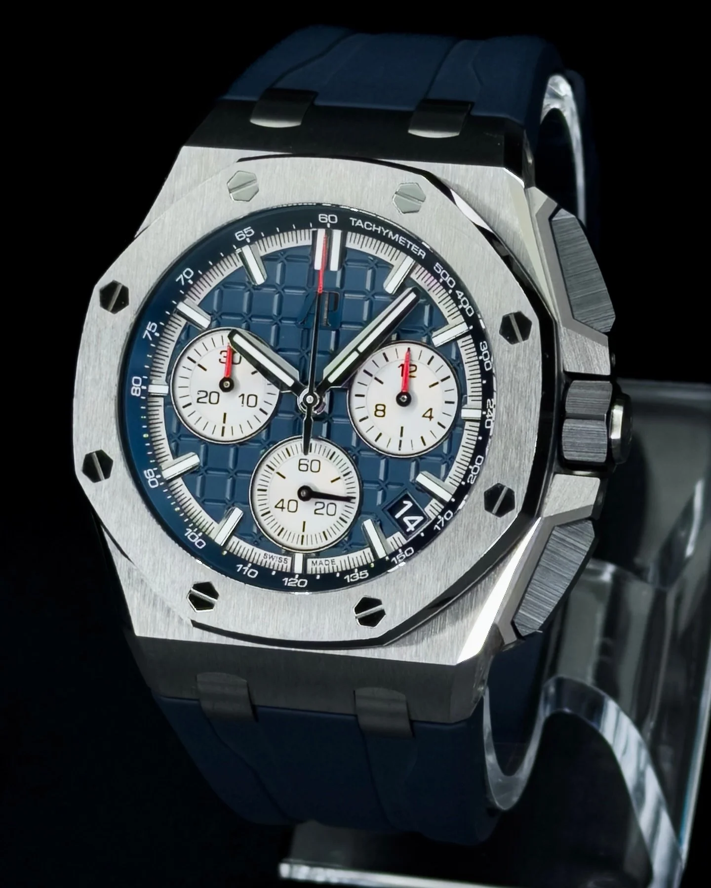 AP Royal Oak Offshore Chronograph (Ref. 26420TI.OO.A027CA.01)

features a lightweight titanium case, blue &ldquo;M&eacute;ga Tapisserie&rdquo; dial and flyback chronograph powered by Caliber 4401. 

With a sapphire caseback, 100m water resistance and