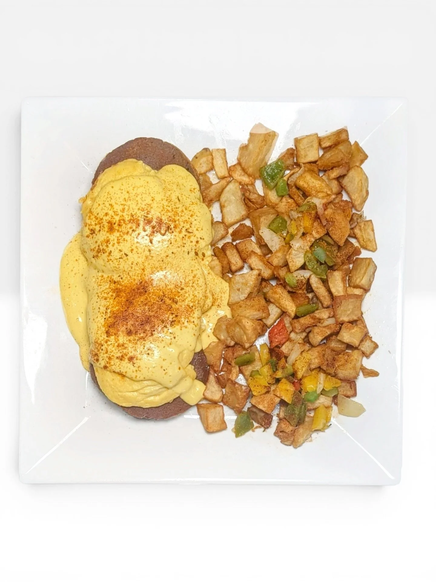 NEW SPECIALS JUST DROPPED!!🔥🔥 And you do NOT want to miss these ones! The first picture we have Eggs Benedict! Yes, you read that right! EGGS BENEDICT! - A toasted English muffin topped with savory maple glazed ham and fluffy scrambled Just  Egg, f