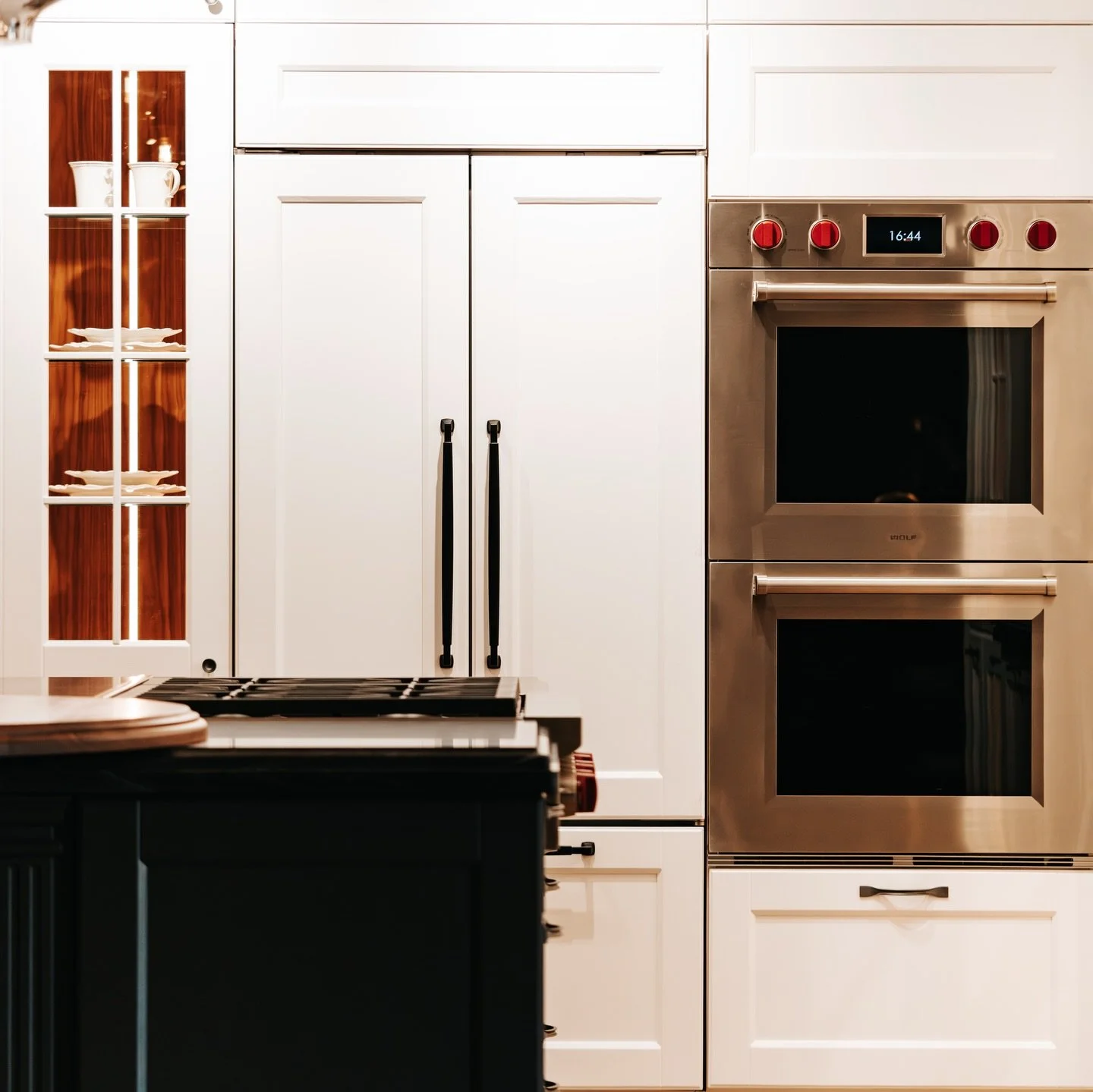 The Bristol kitchen by Halupczok, on display in the Herb &amp; Oak showroom, blends timeless architectural detail with modern functionality. Thoughtful craftsmanship, hidden storage, and integrated technology come together to show how classic design 