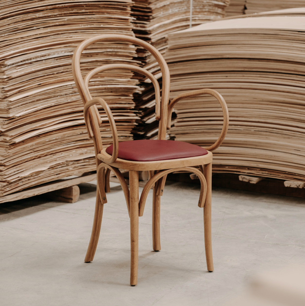 NOMO handmade wooden Thonet dining chair with curved backrest, curated by Nuovo Kitchens Vancouver.