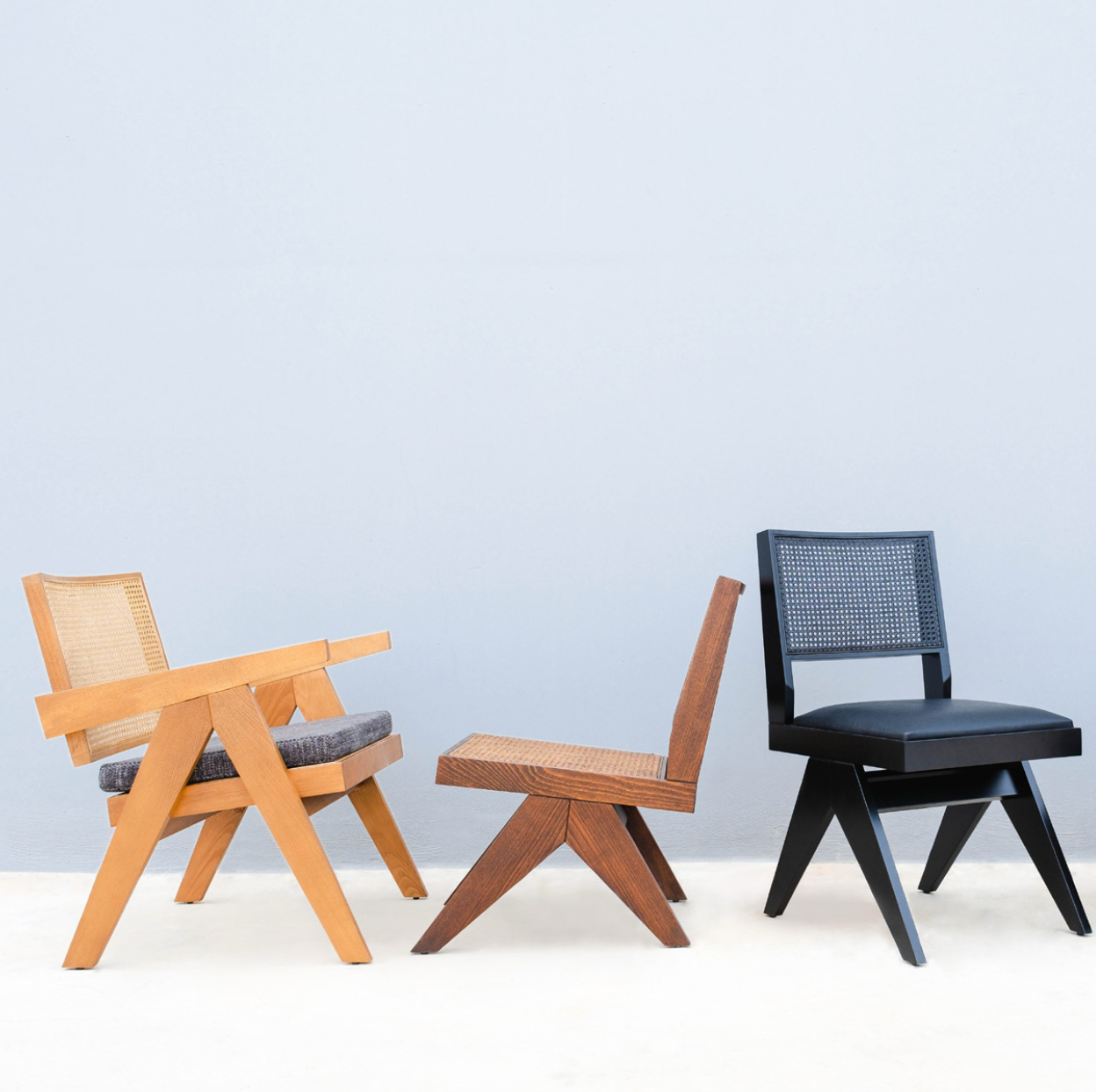 Luxury NOMO oak, walnut and black dining chairs with natural Hazeran cane backrest and steam-bent wood frame for high-end dining rooms by Nuovo Kitchens Vancouver.