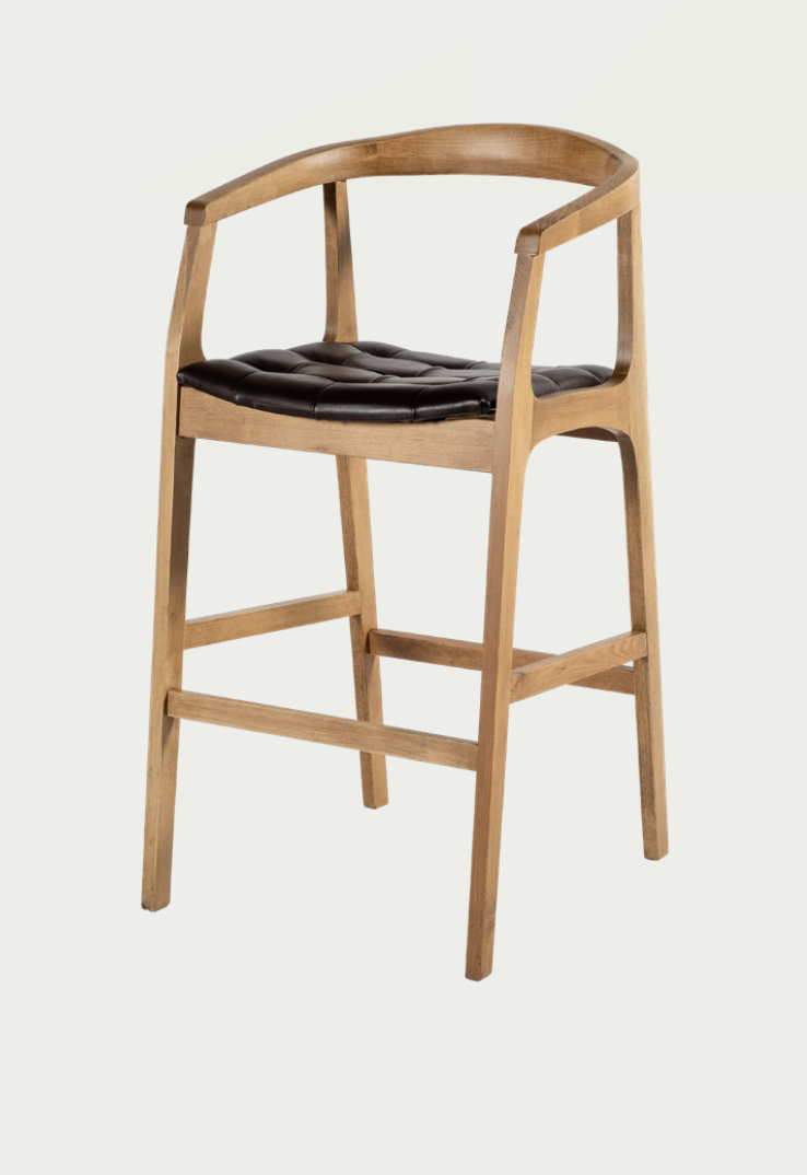 Artisan Nomo wooden bench with luxury black upholstery and steam-bent wood frame for high-end living spaces; by Nuovo Kitchens Vancouver.