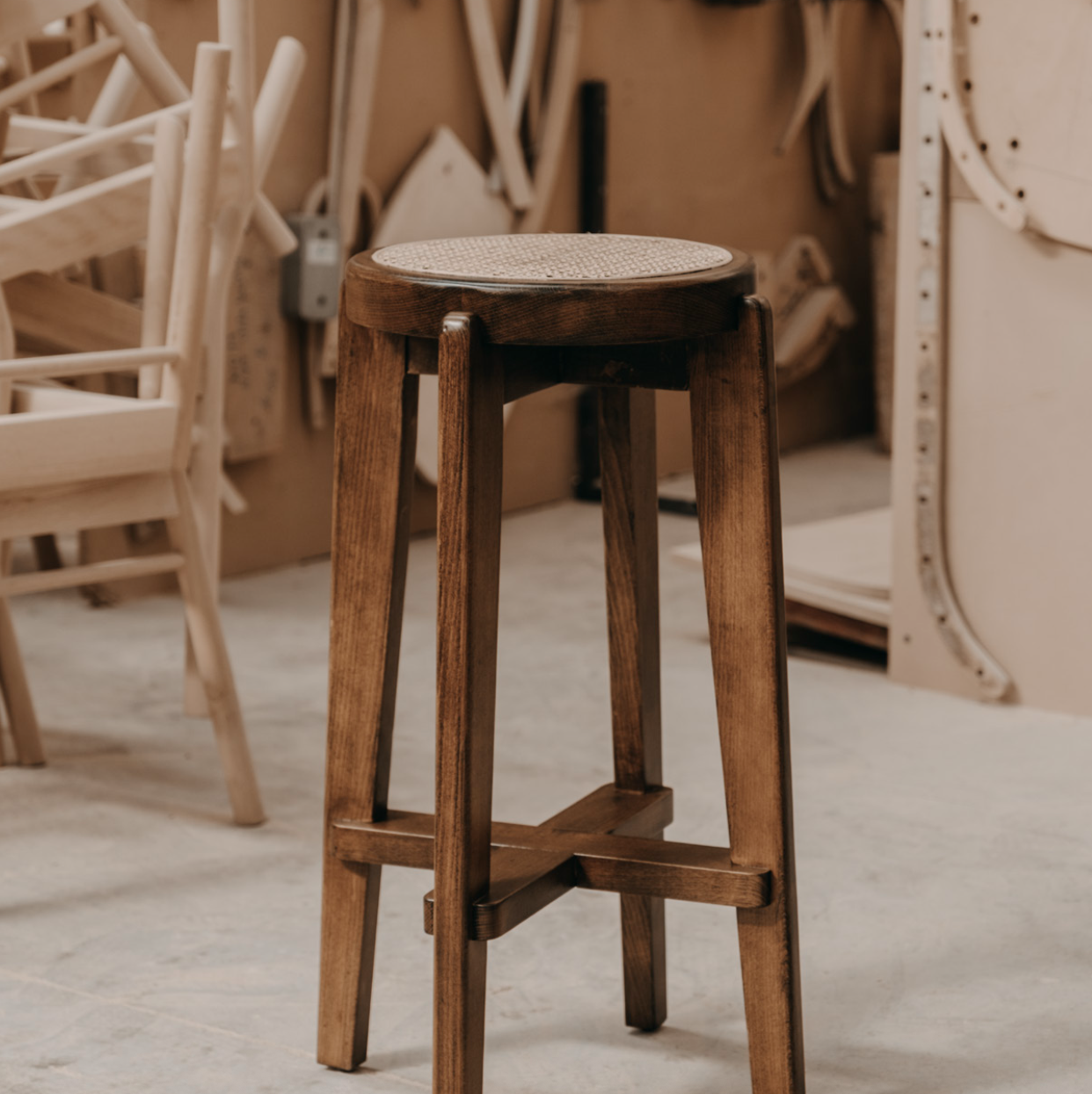Nomo handmade wooden bench with woven Hazeran seat, perfect for a luxury modern  kitchen island, by Nuovo Vancouver.