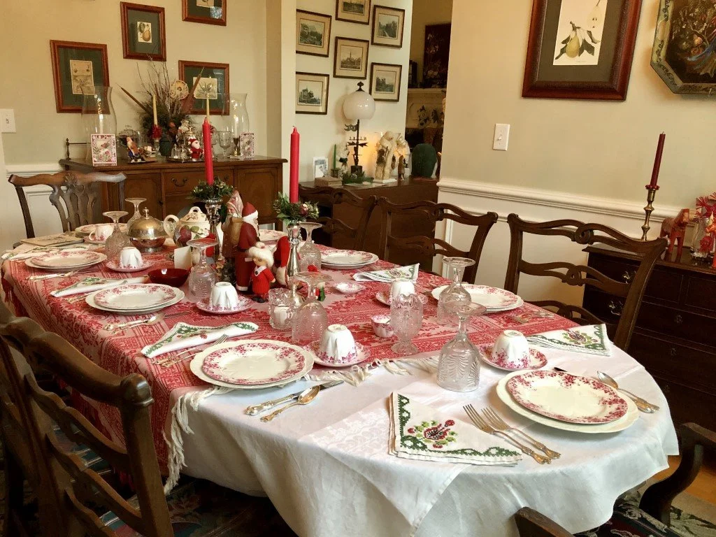 Christmas Tea: Shelley Dainty Pink #051/P, together with pre-Civil War inverted Fern pattern glass, Towel Old Colonial sterling flatware, handmade linen napkins, and Scandinavian Tomte Santas.