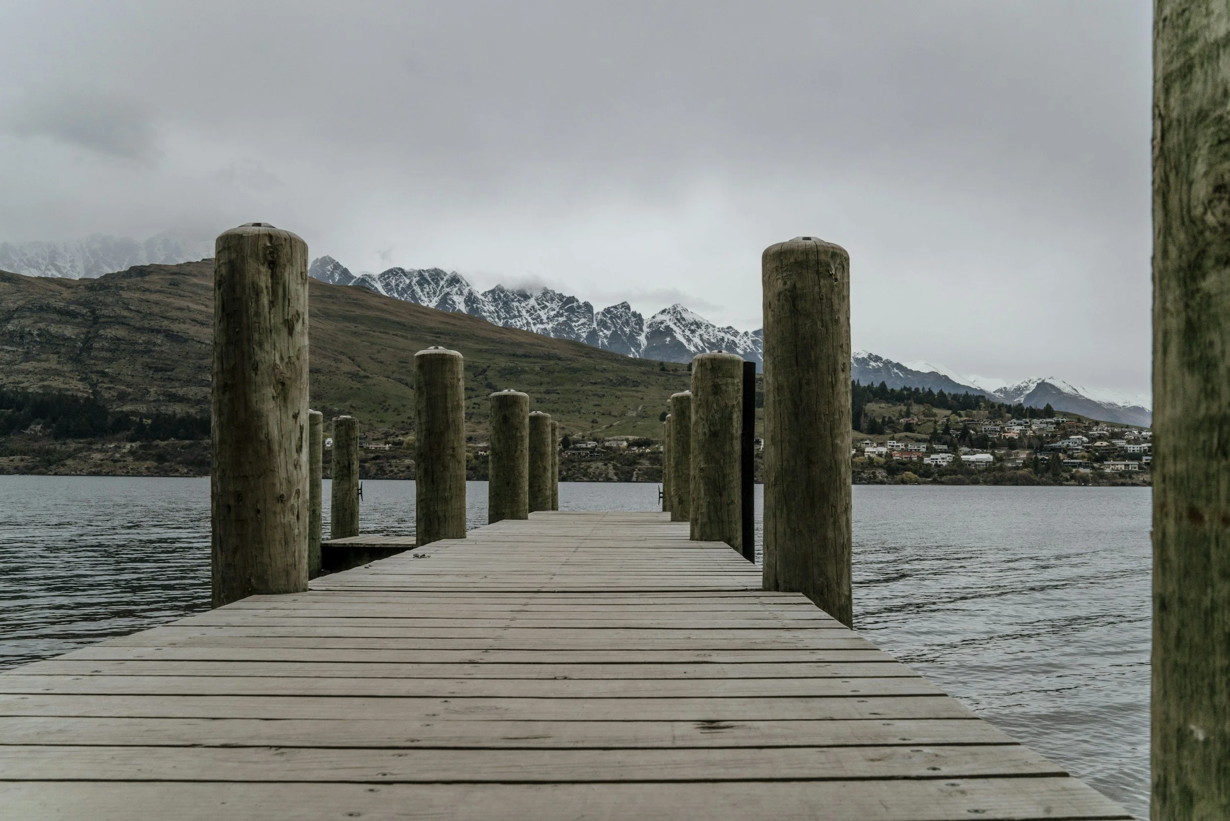 Bathers soaking in the morning with coffees in hand at Bathe hot pools Queenstown.
