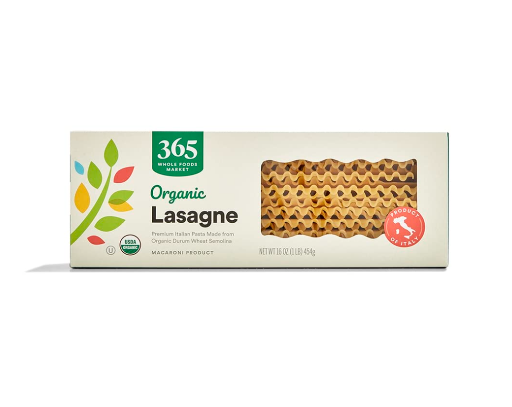 Package of organic Lasagne pasta with clear window showing wavy, textured noodles, labeled as made in Italy.