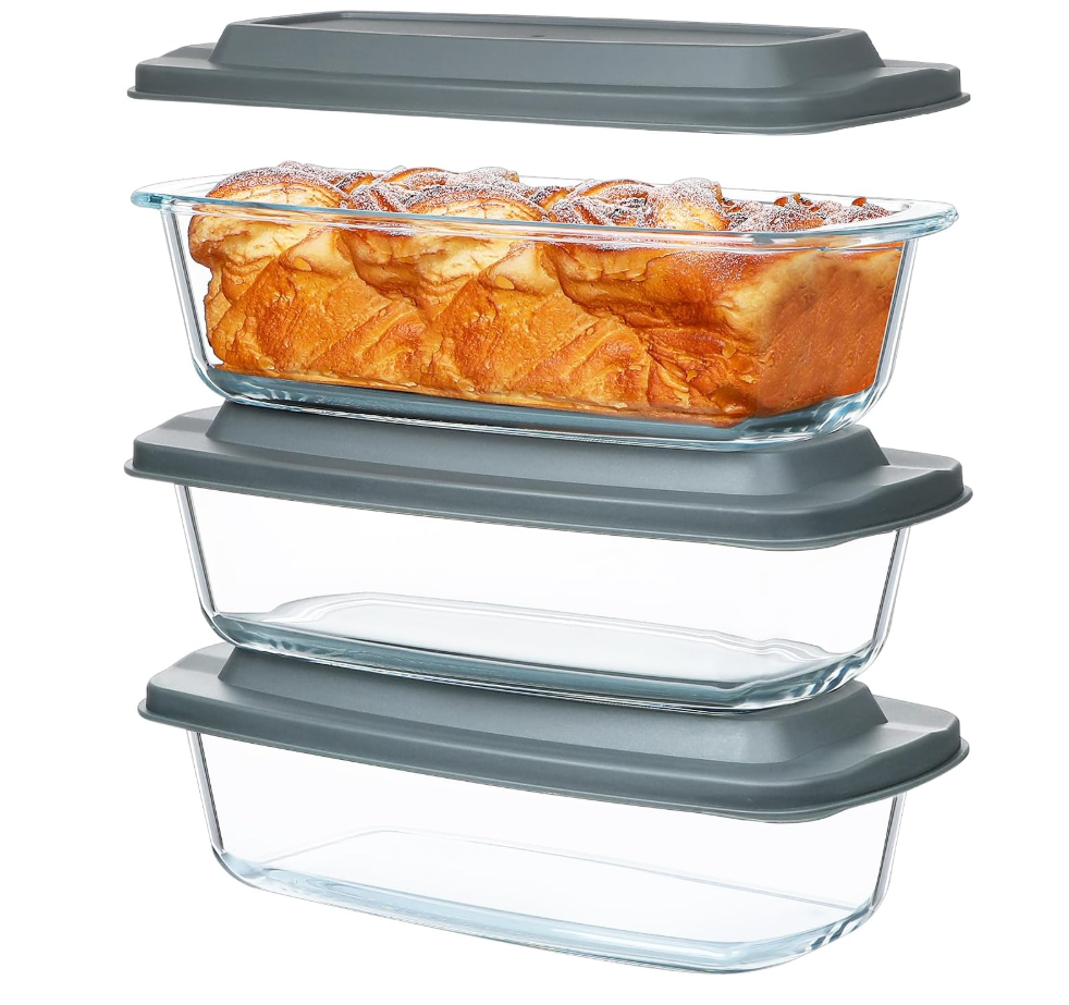 Glass food storage containers with gray lids, stacked, containing fried food.