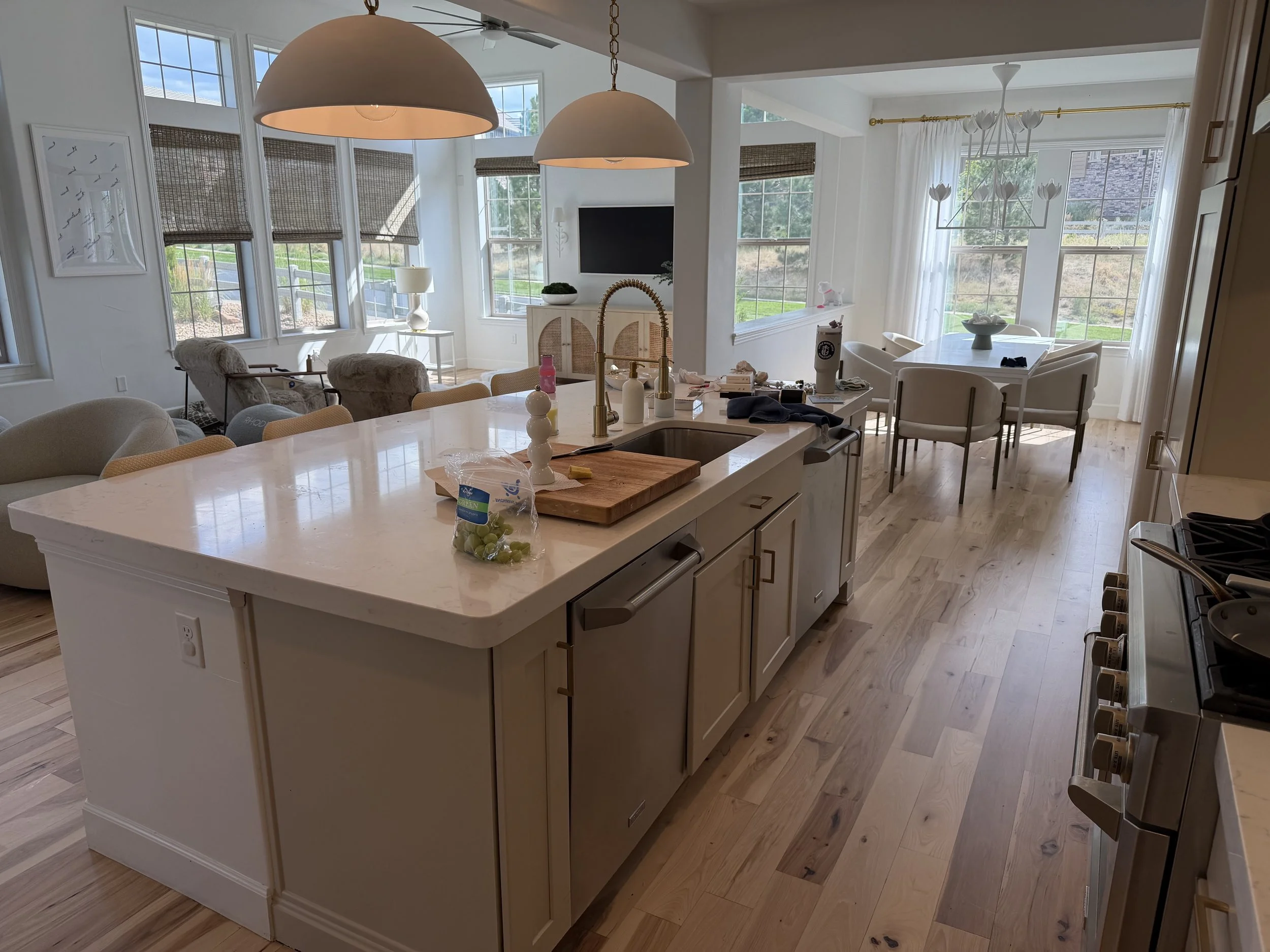 Hardwood floor project through kitchen with Island in Highlands Ranch