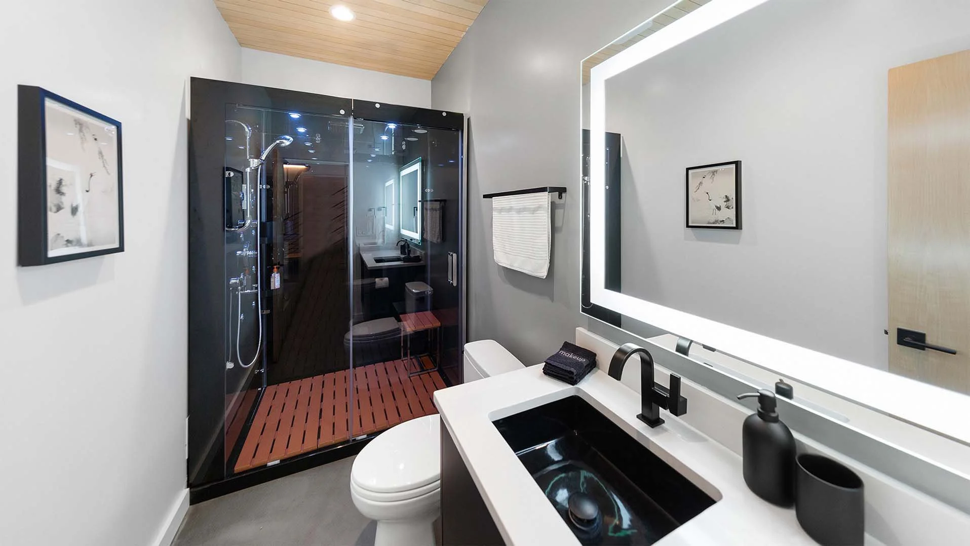 RAVN HAUS vacation rental Understory bathroom with steam shower/sauna, and modern finishes in Government Camp, Oregon.