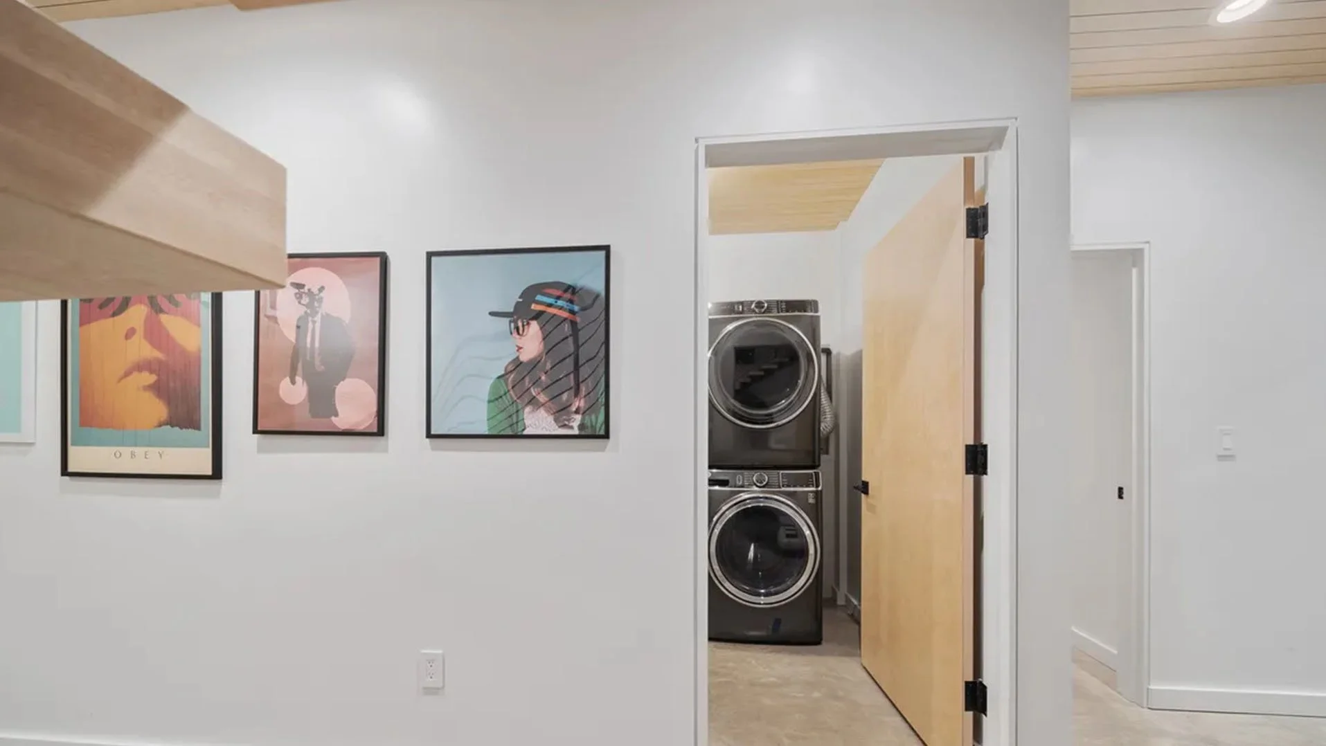 RAVN HAUS vacation rental Forest Floor Nook with curated art gallery wall and laundry room on Mt. Hood, Oregon.