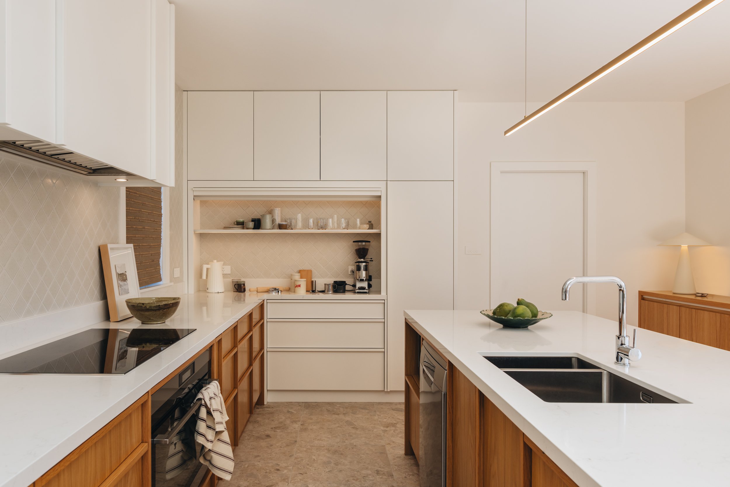 Warm family kitchen design NZ  with large storage - Honour Creative