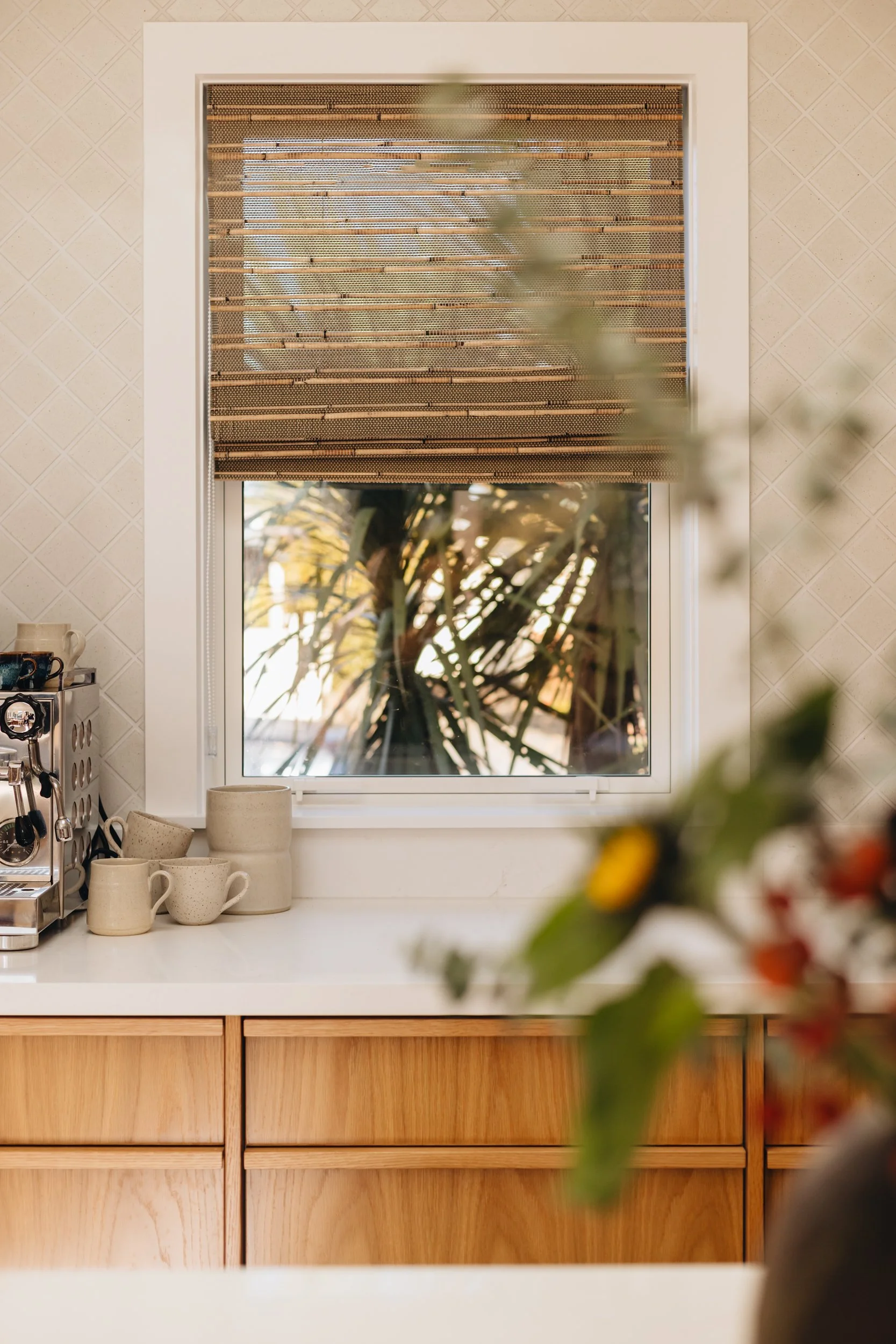 Warm family kitchen design NZ  with textured blinds - Honour Creative