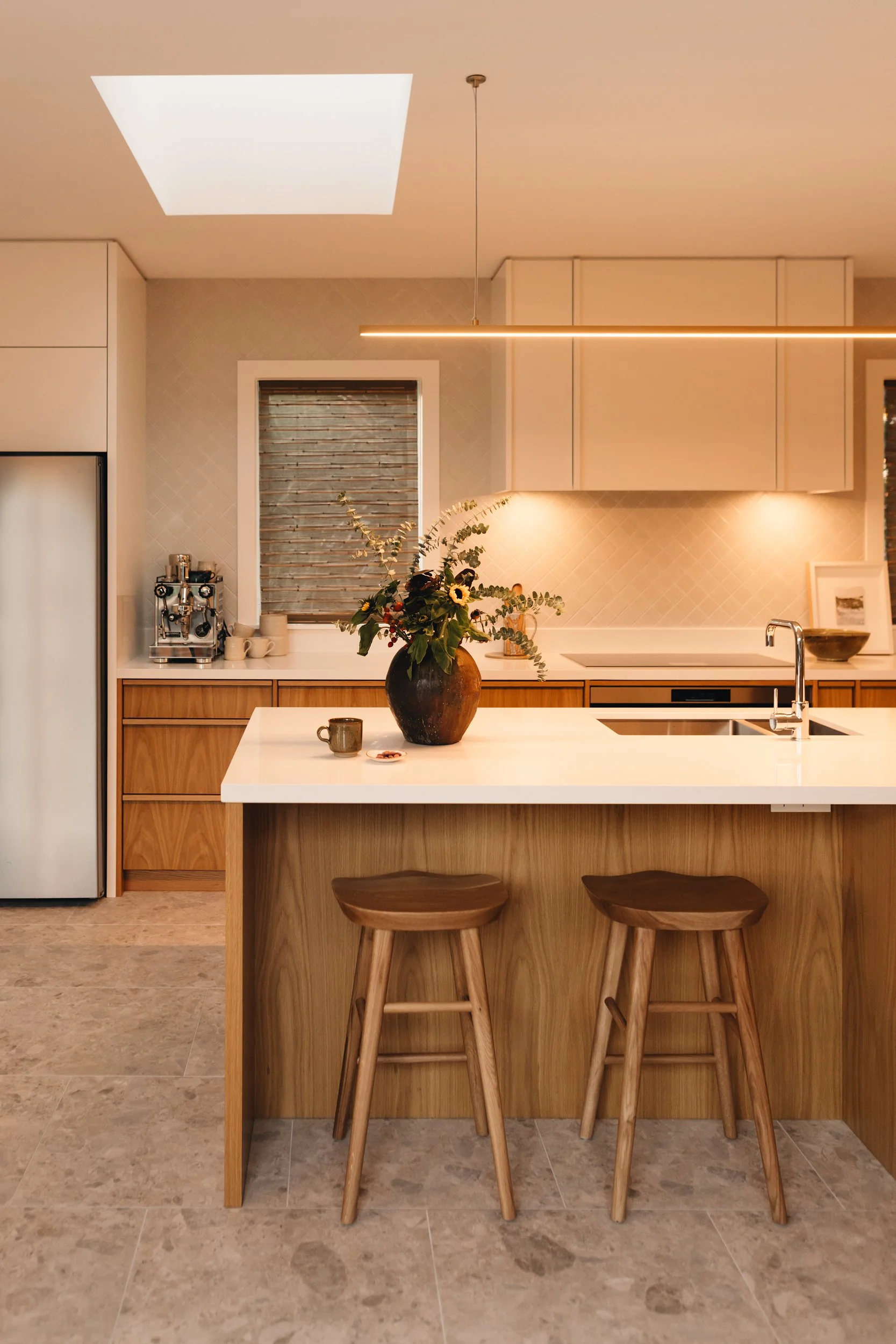 Warm family kitchen design NZ  with skylight  - Honour Creative.