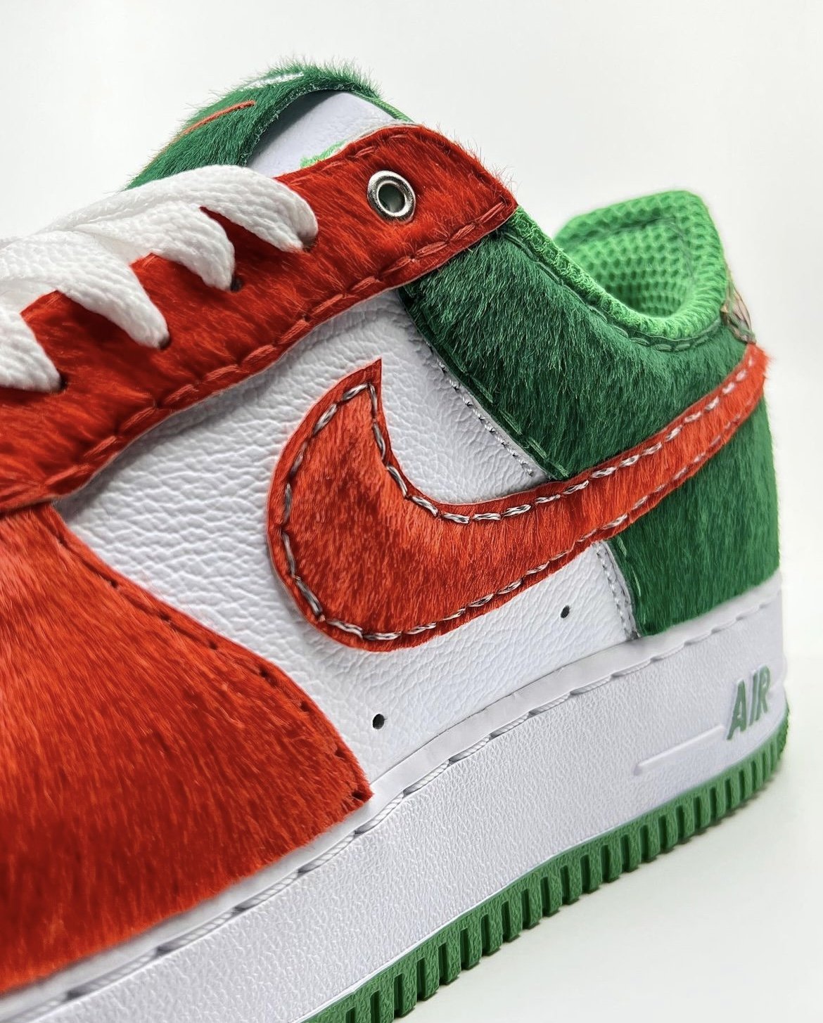 "Rattlers - Away" Nike Air Force 1 for Florida A&M University. Leathers used: Green Pony, Orange Pony, Sedona Anaconda.