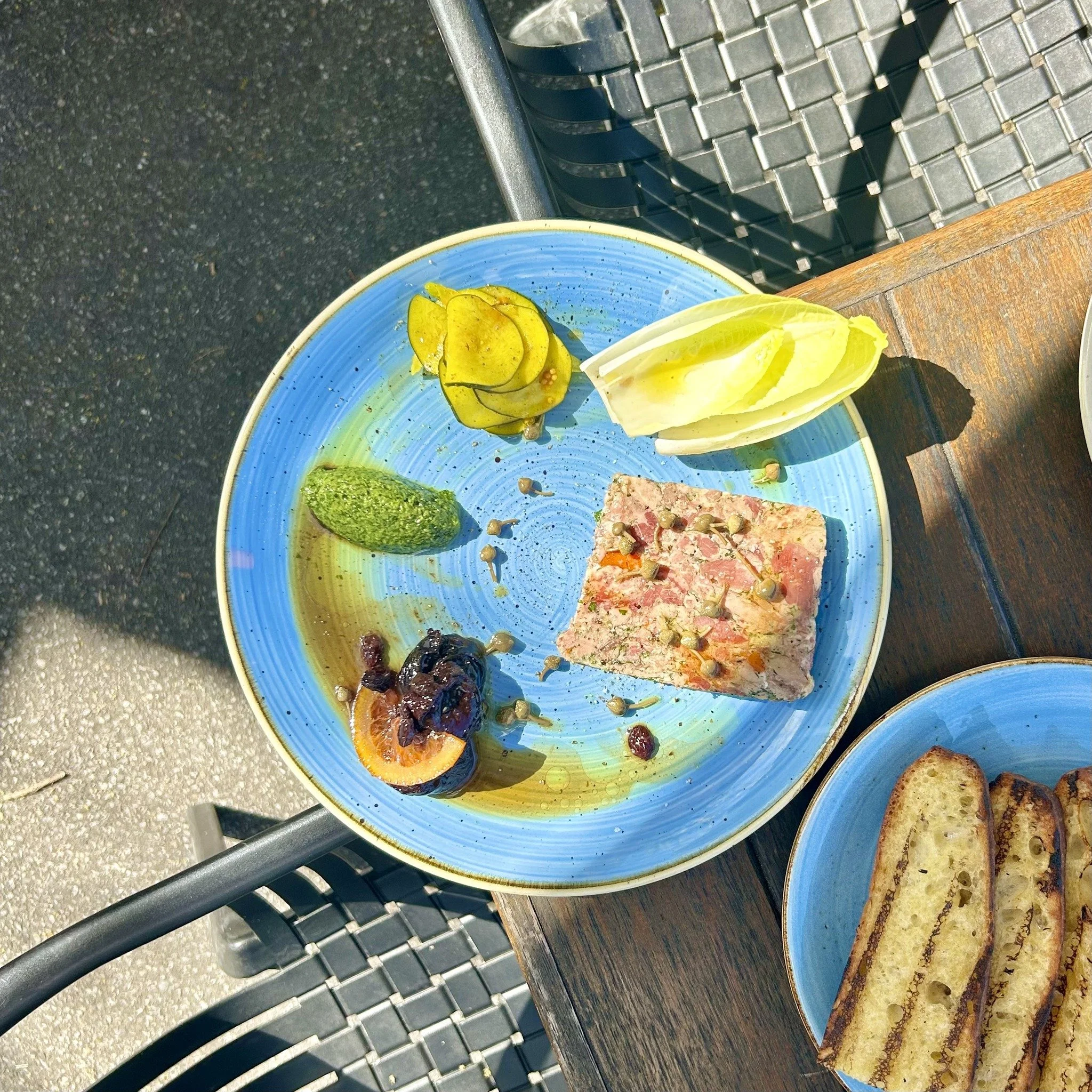 A layered treat. 

Barossa Valley duck and cotechino terrine, zuni pickle, salsa verde, spiced prunes w house bread.