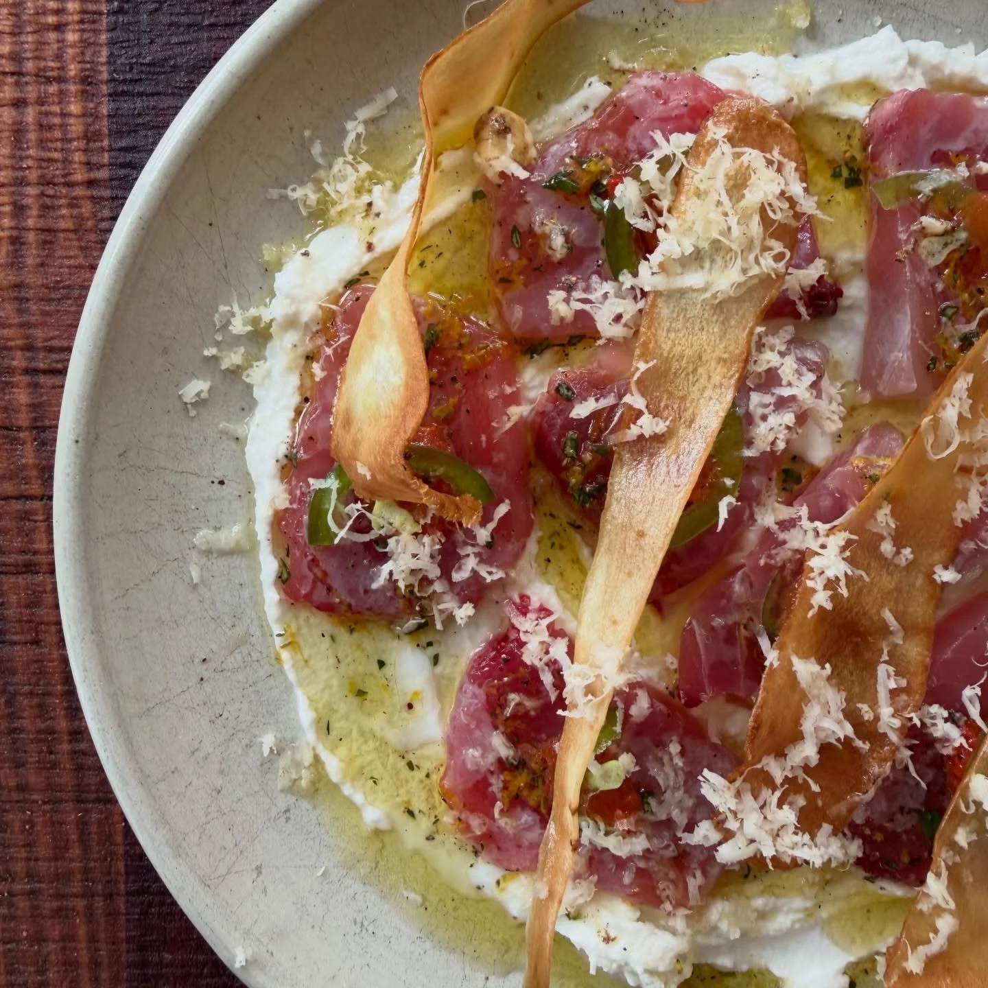 Into autumn 🍂 
.
raw yellowfin tuna 🍣 
roasted salty jalape&ntilde;o 
goat curd 
fried parsnip 
orange and thyme oil 
langhorne creek horseradish 
.
.
#autumn