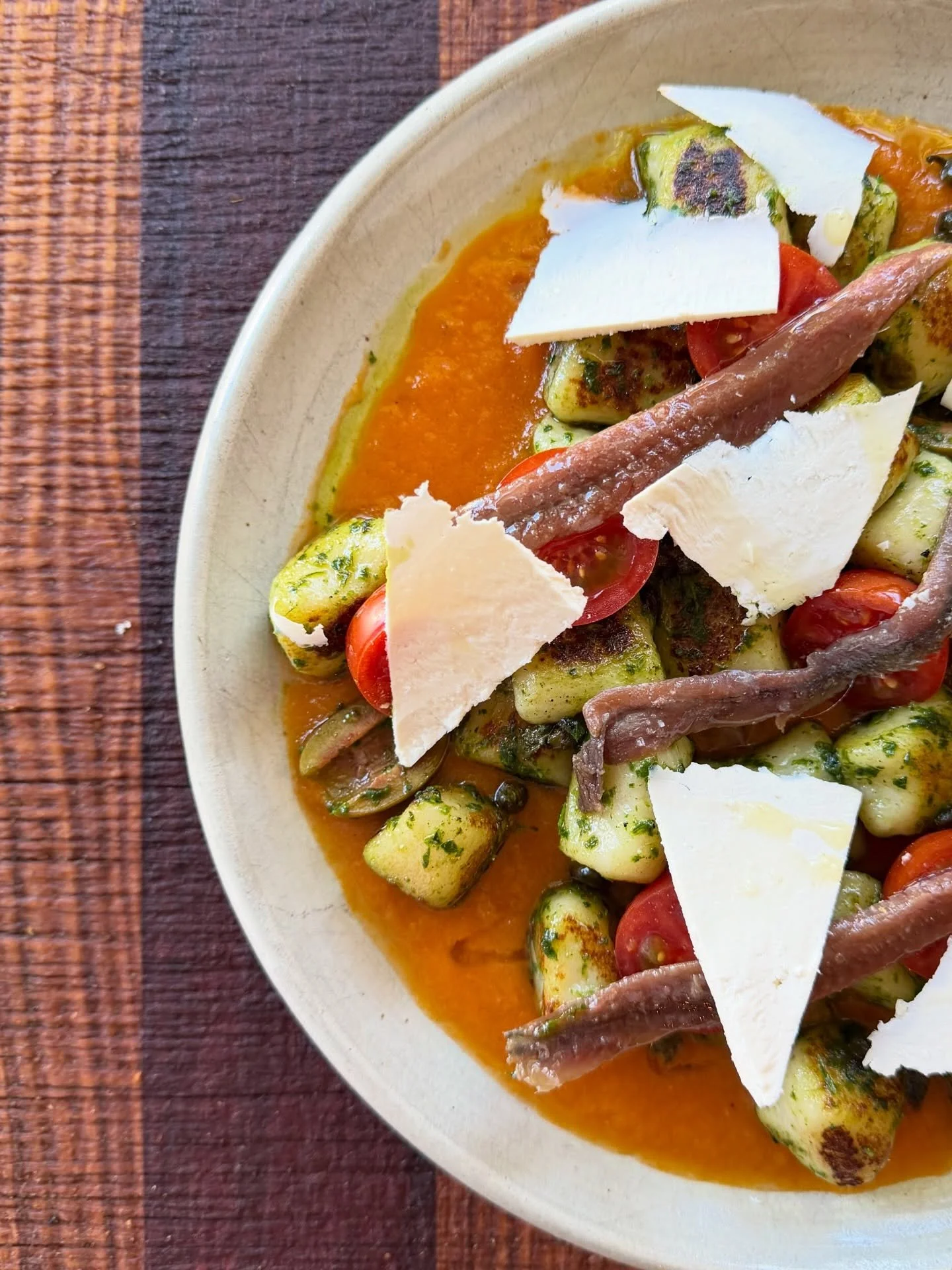 I know it&rsquo;s not summer yet but we&rsquo;ve got these delicious homegrown tomatoes from my mate @jordytheo1 and I just had to share a beautiful dish 🍅 of potato gnocchi a&rsquo;la puttanesca 
.
.
pan fried gnocchi
basil pistou 
ricotta salata 
