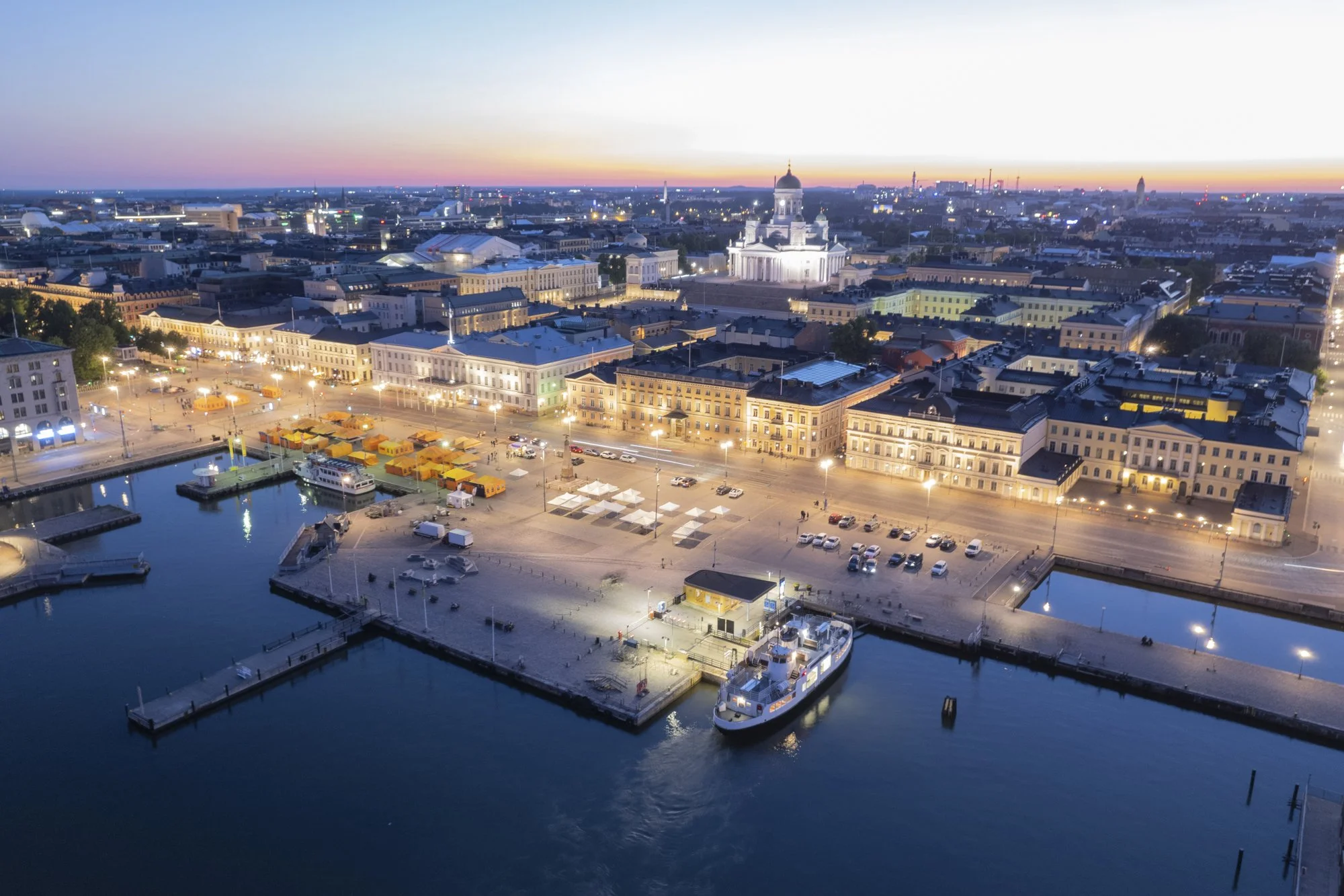 Aerial view of the Market square in Helsinki, Finland during a clear summer night.