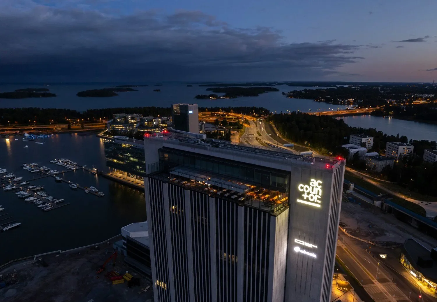 Aerial view of the Keilaniemi business center and surrounding archipelago in Espoo, Finland.