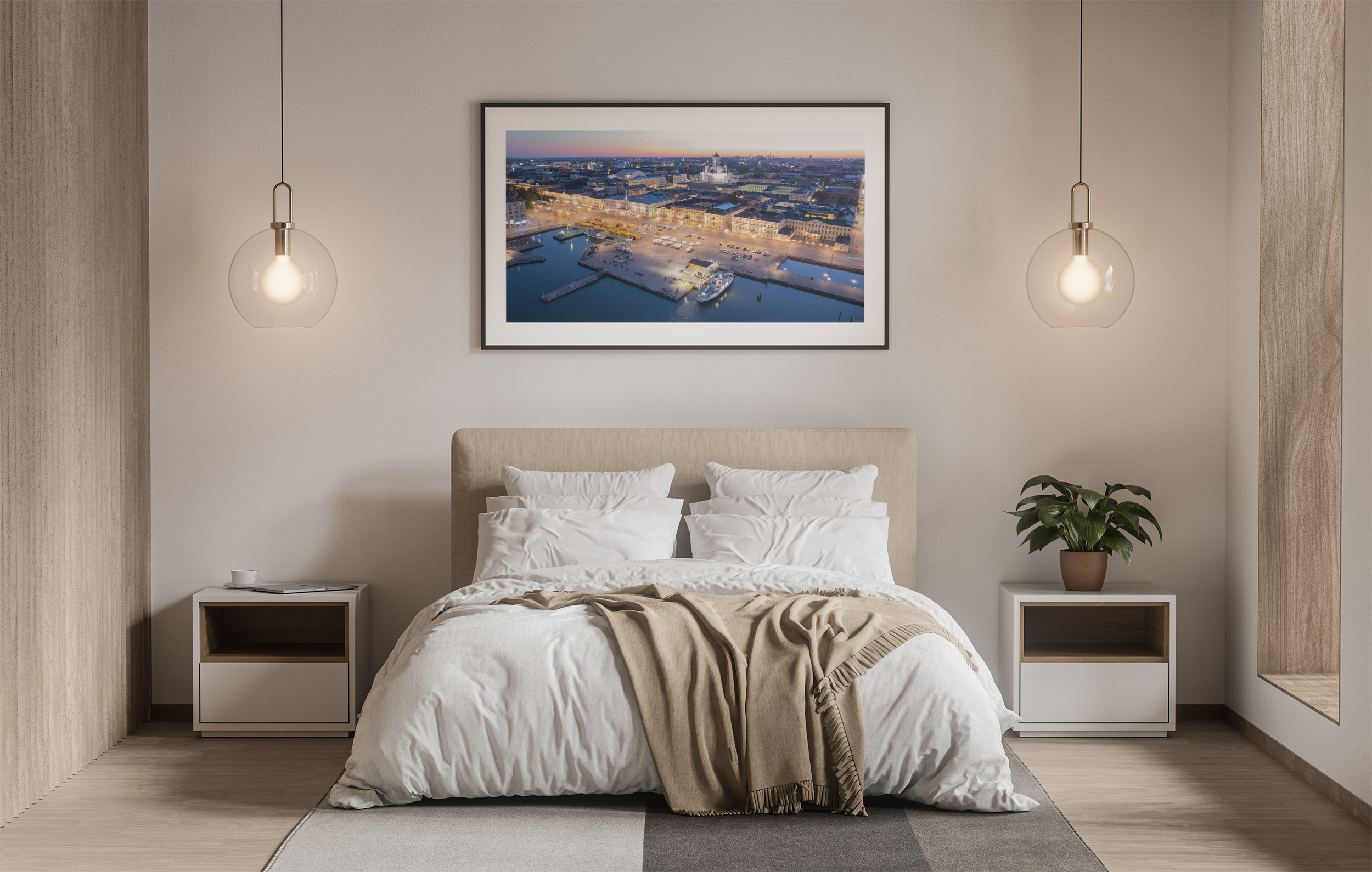 A bedroom with a beige bed and white bedding, two white nightstands with open shelves, one with a cup and notebook, a potted plant on the right nightstand, framed cityscape photograph above the bed, wooden wall panels on side walls, and two hanging pendant lights