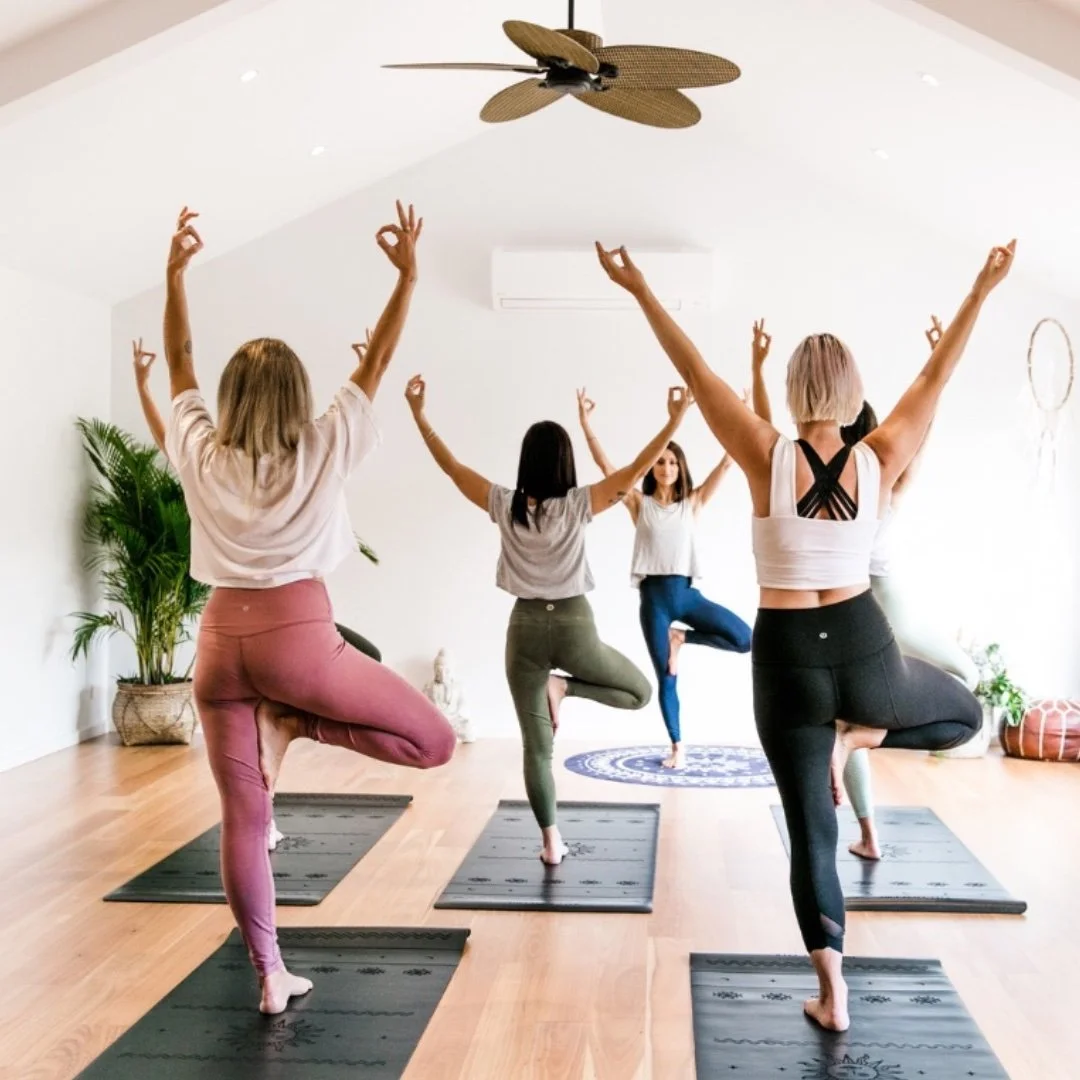 summer-house-retreat-yoga-studio-tree-pose-group-practice.jpg