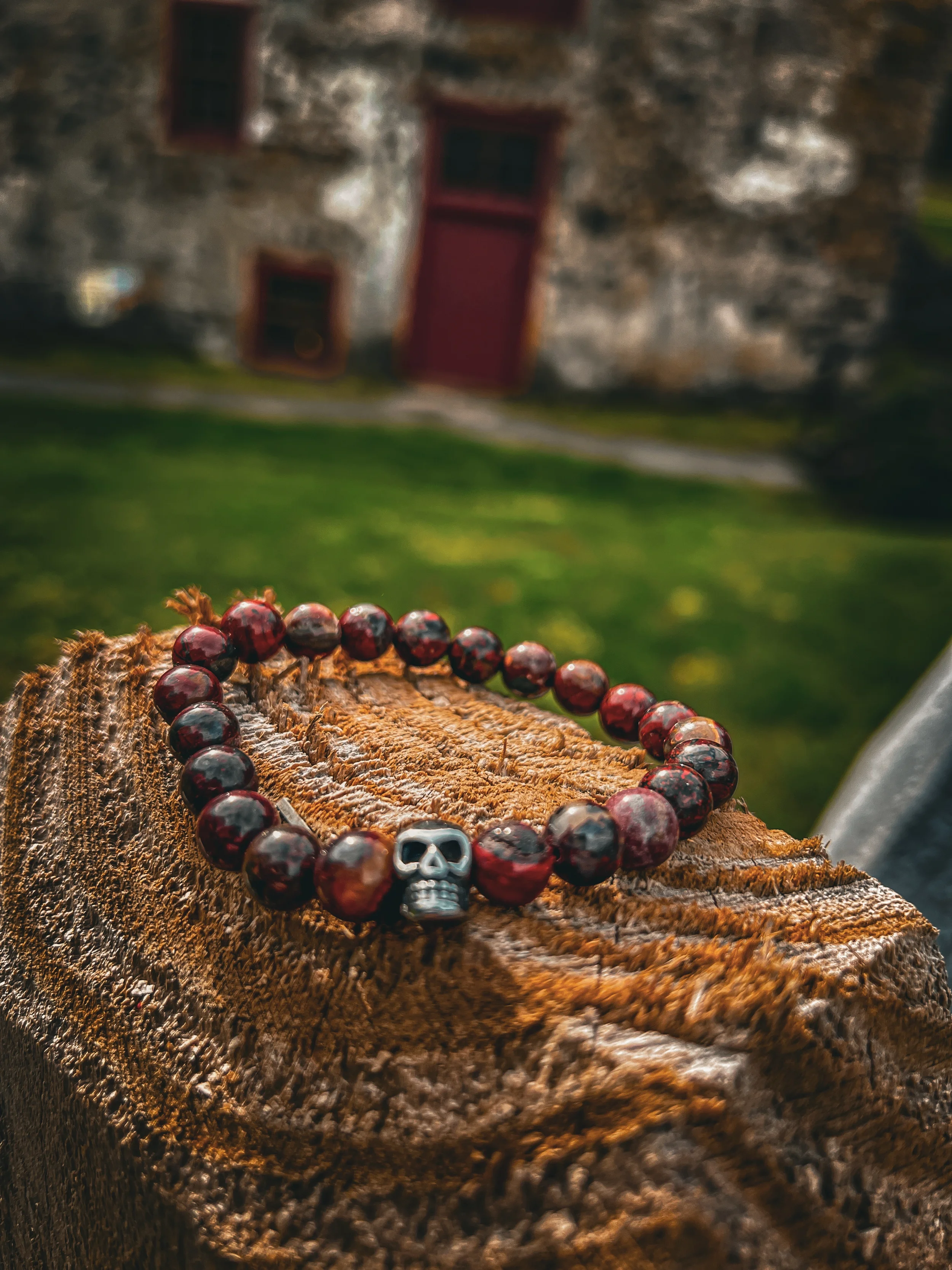 Mala-for-Vets-skull-red-picture-jasper-rock-building-newlin-grist-mill.webp