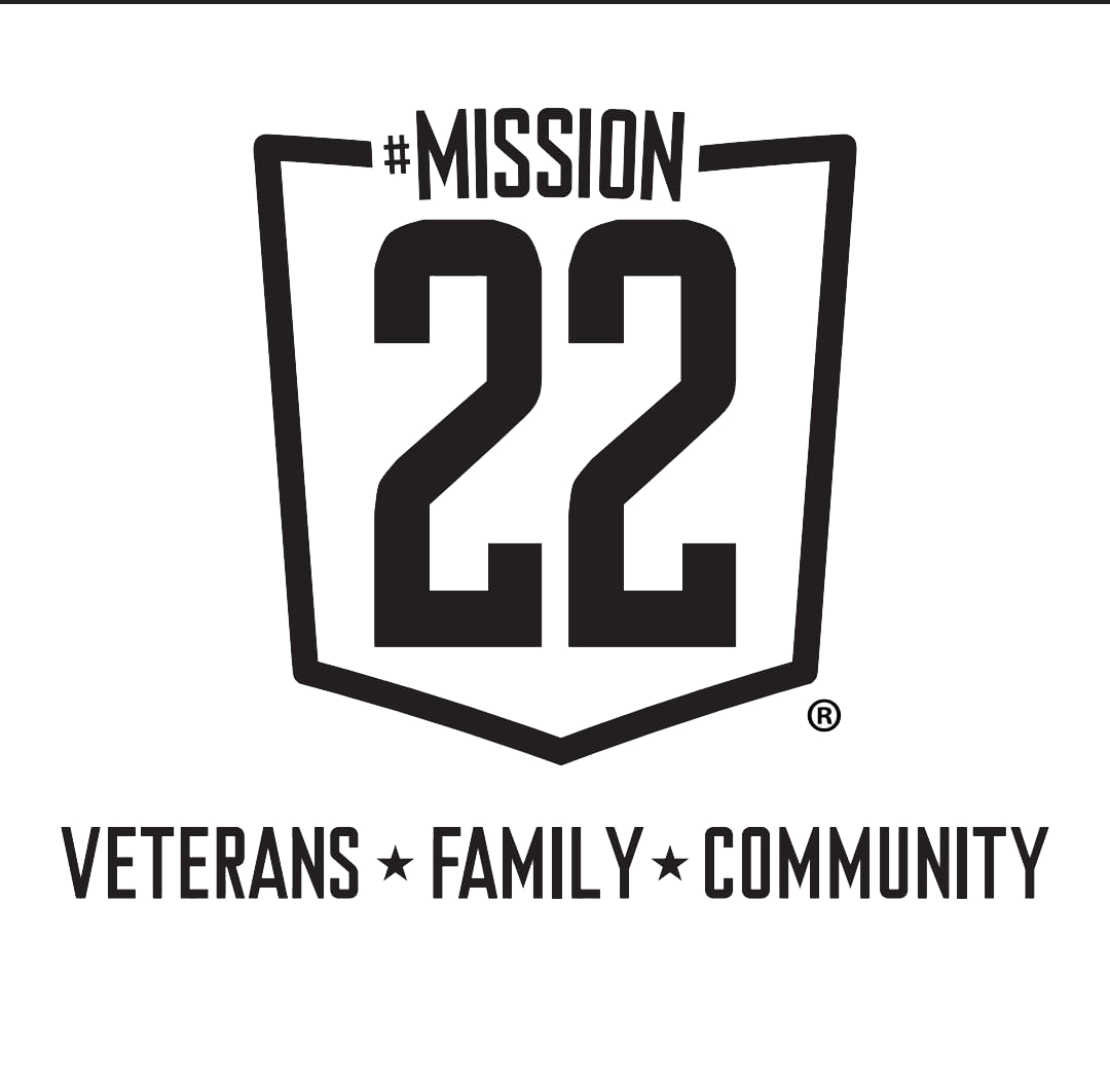 Black and white logo for Mission 22, an organization supporting veterans, family, and community. The logo features a shield with the number 22 and the text Mission 22 above it. Below the shield are the words Veterans, Family, and Community separated by stars.