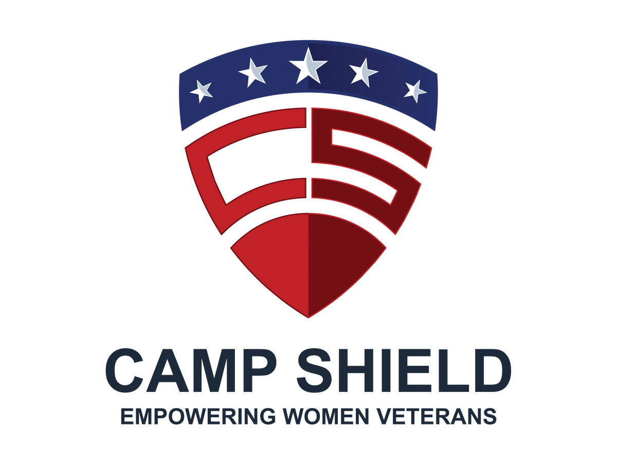 Logo with a shield shape featuring red bars and a blue crown with white stars above, and the text 'Freedom Fest' below.