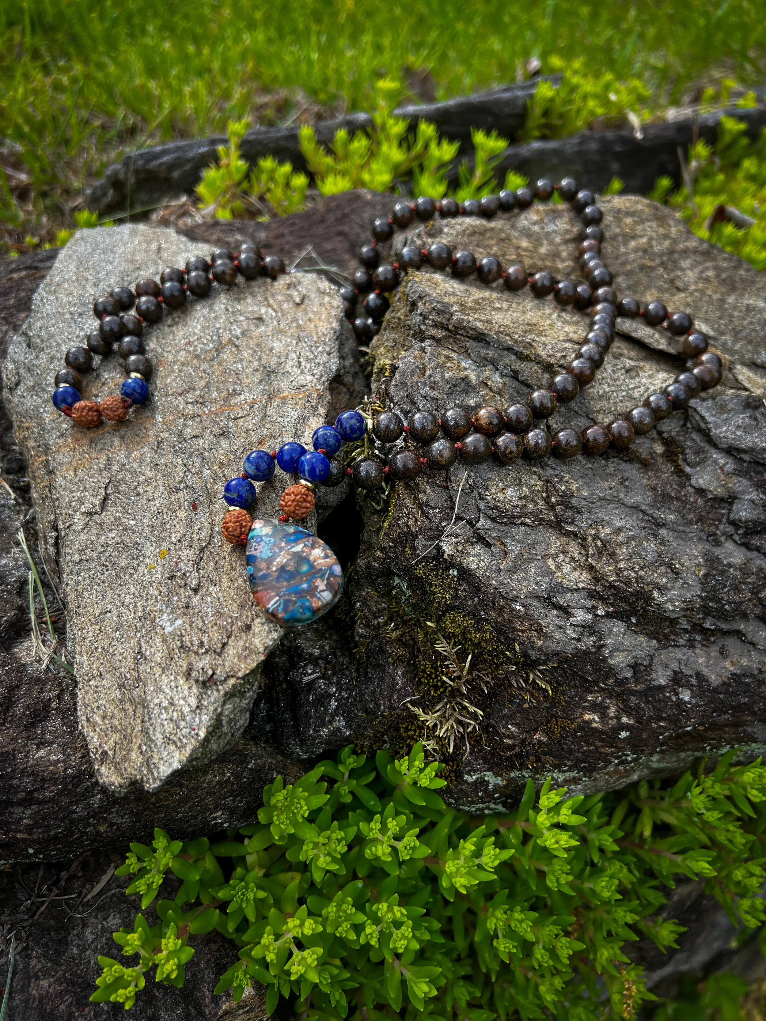 Mala-for-Vets-bronzite-rudraksha-lapis-lazuli-rock-grass-newlin-grist-mill.webp