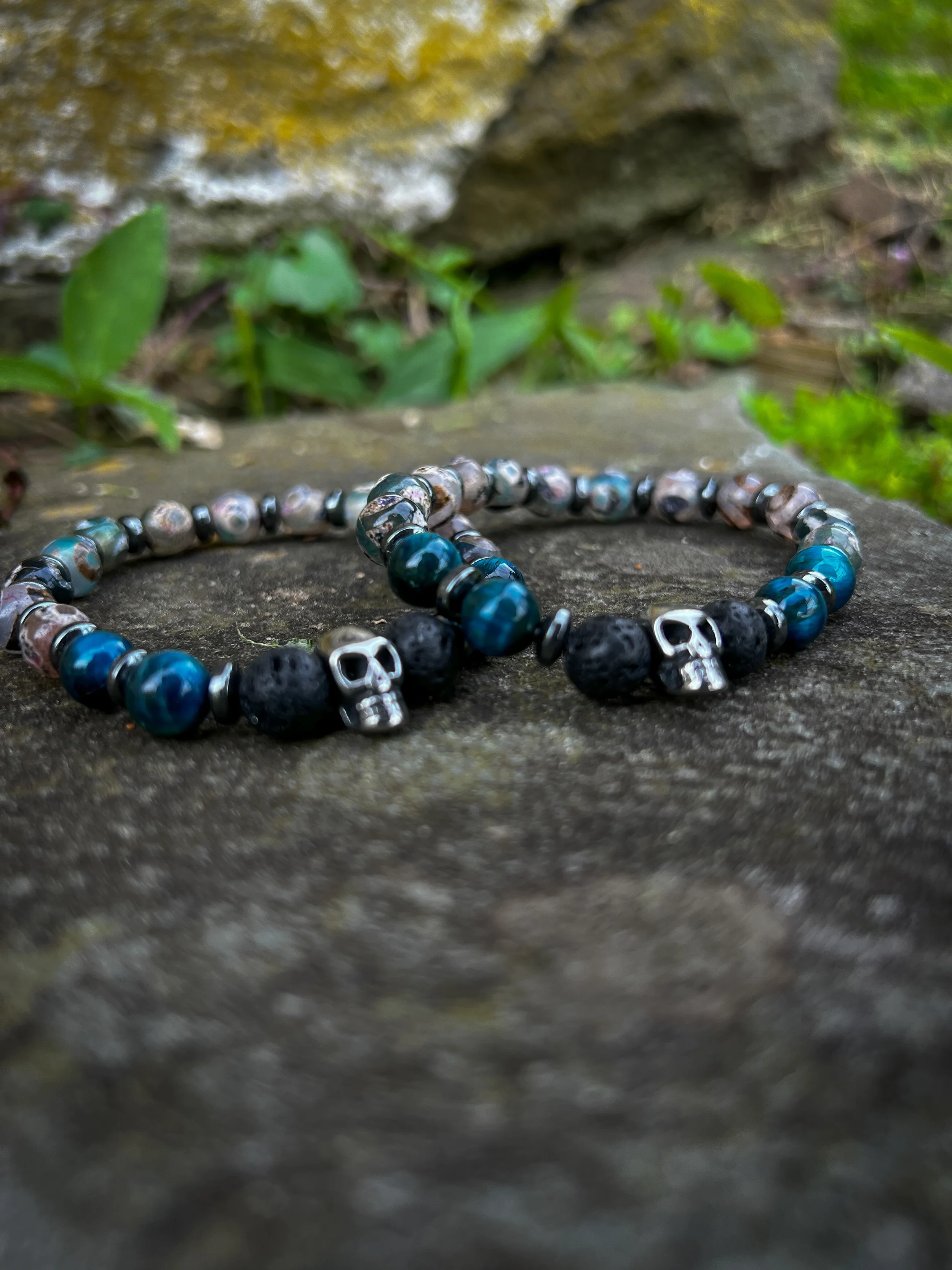 Mala-for-Vets-hematite-lava-dzi-aqua-blue-tiger-eye-skulls-stone--newlin-grist-mill.webp