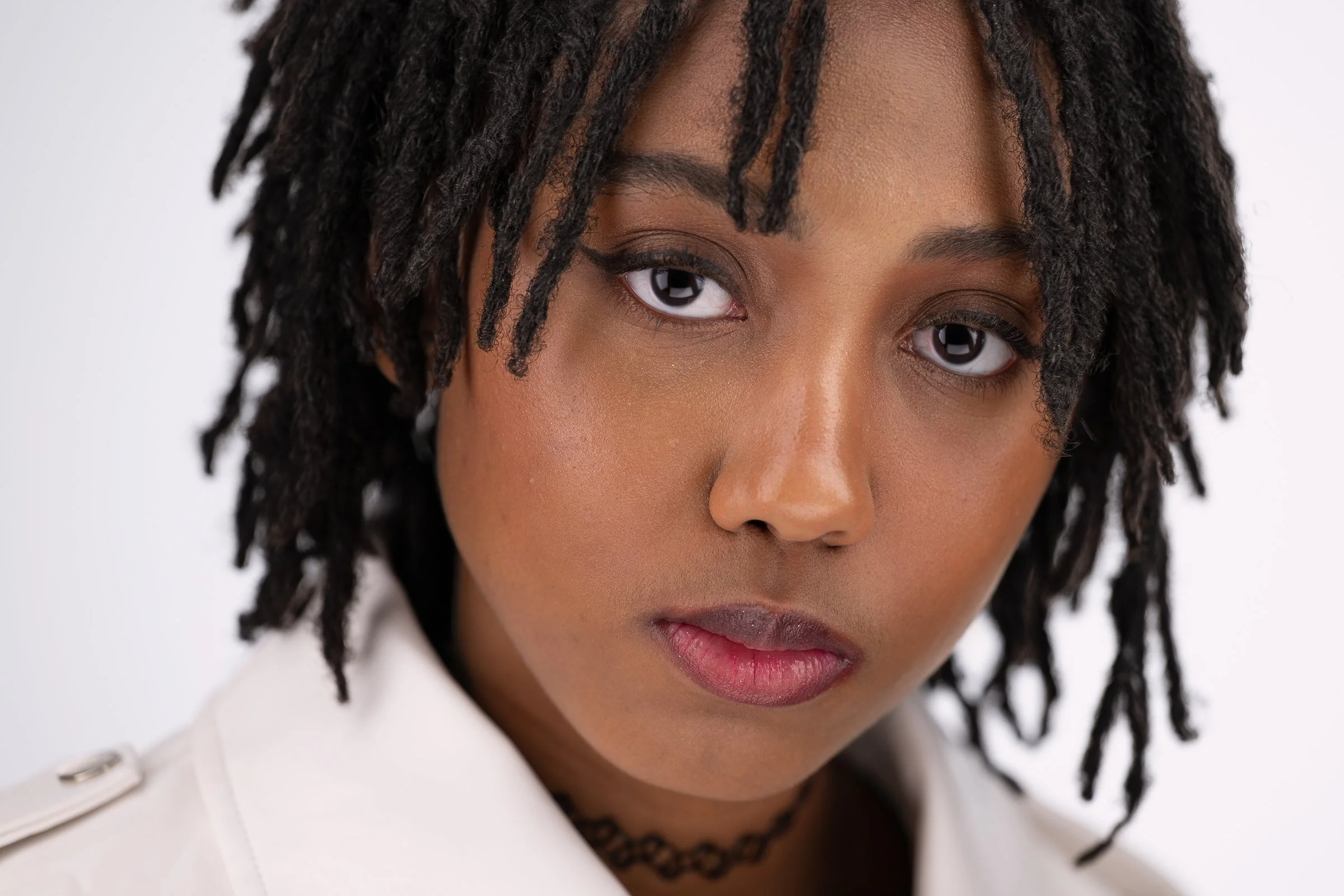 Personal branding headshot of a woman with dreadlocks