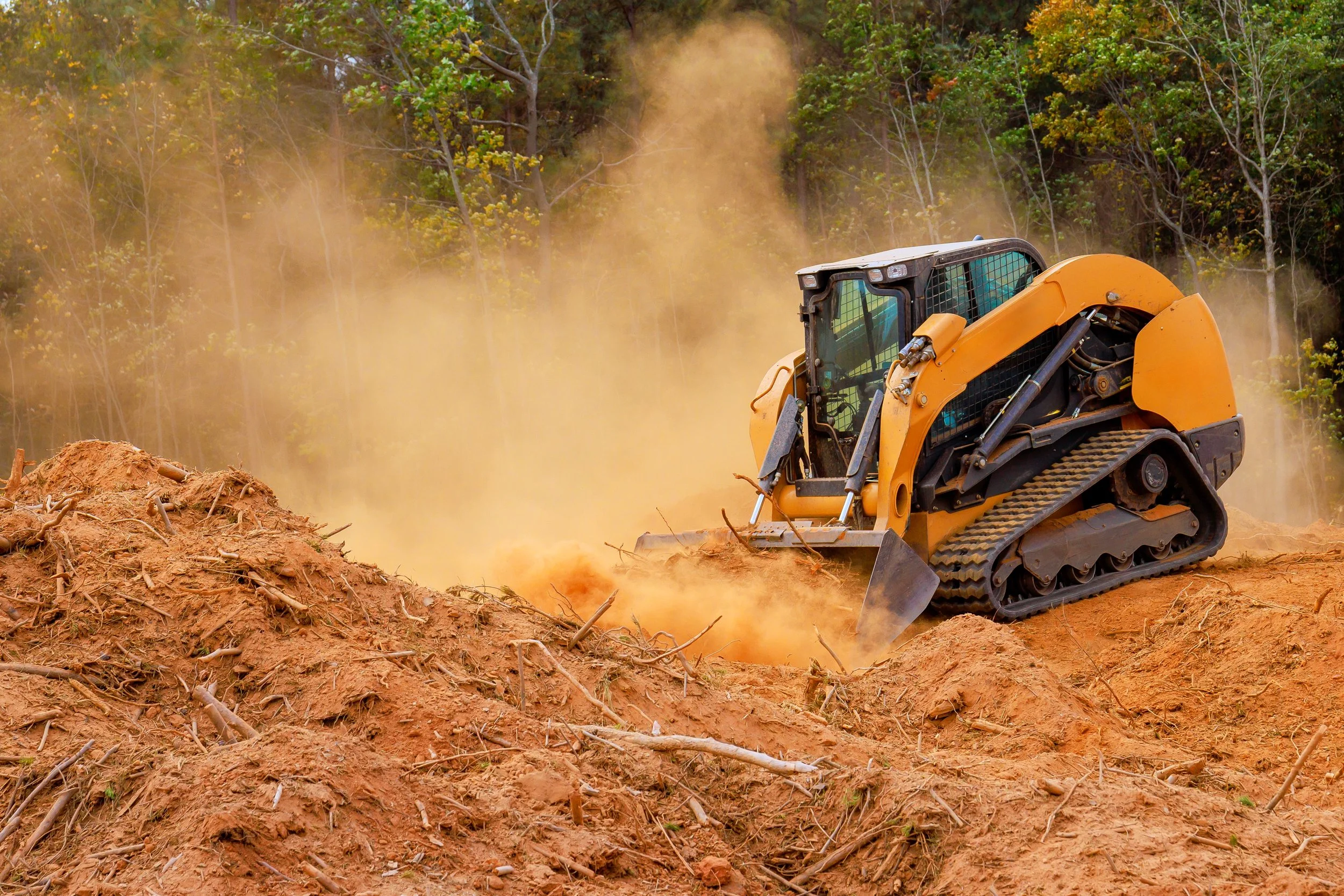 skid steer loader rental in use on construction site in Louisiana
