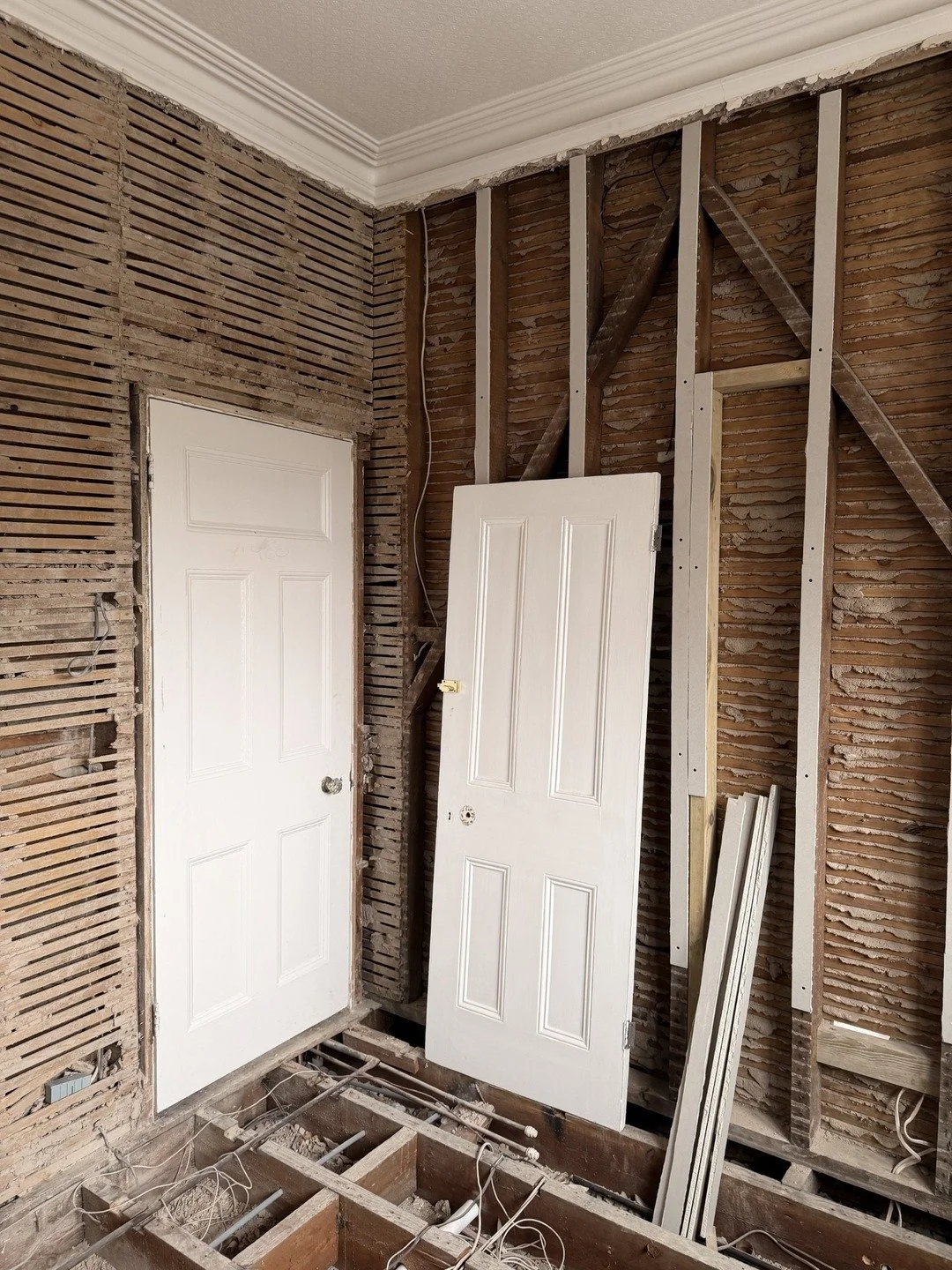 Before - Removing the door to the bedroom and creating an alternative access through the adjacent bedroom gives privacy and completes the master suite