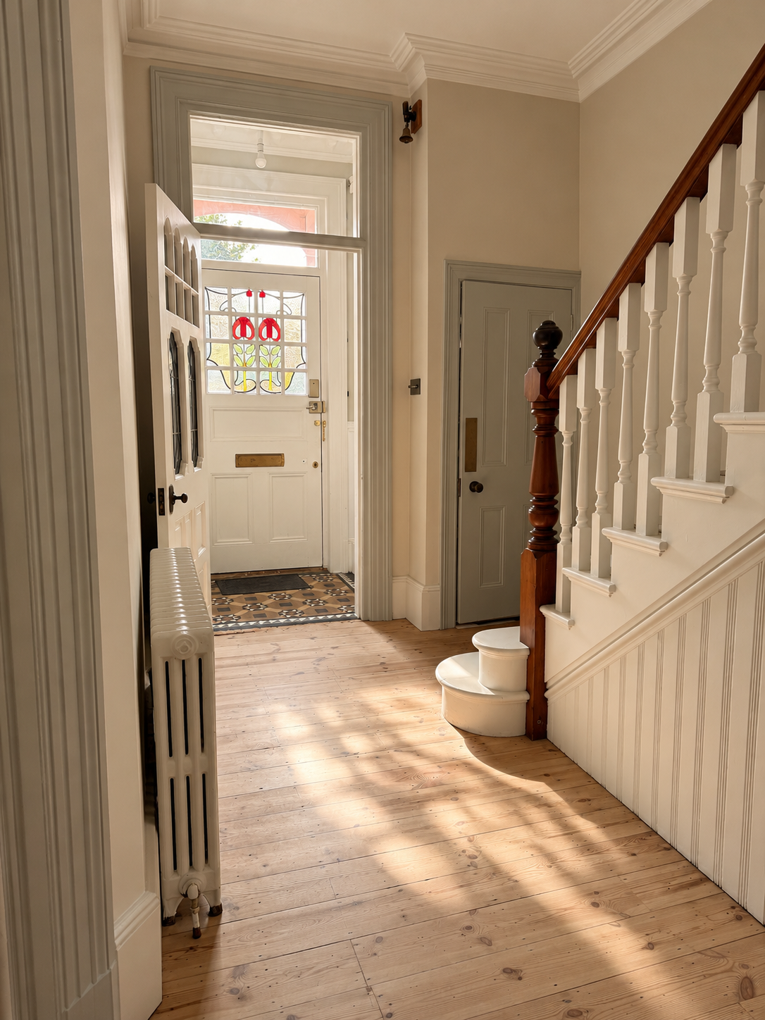 After - stripped original floorboards give and clean, light first impression when entering the house 