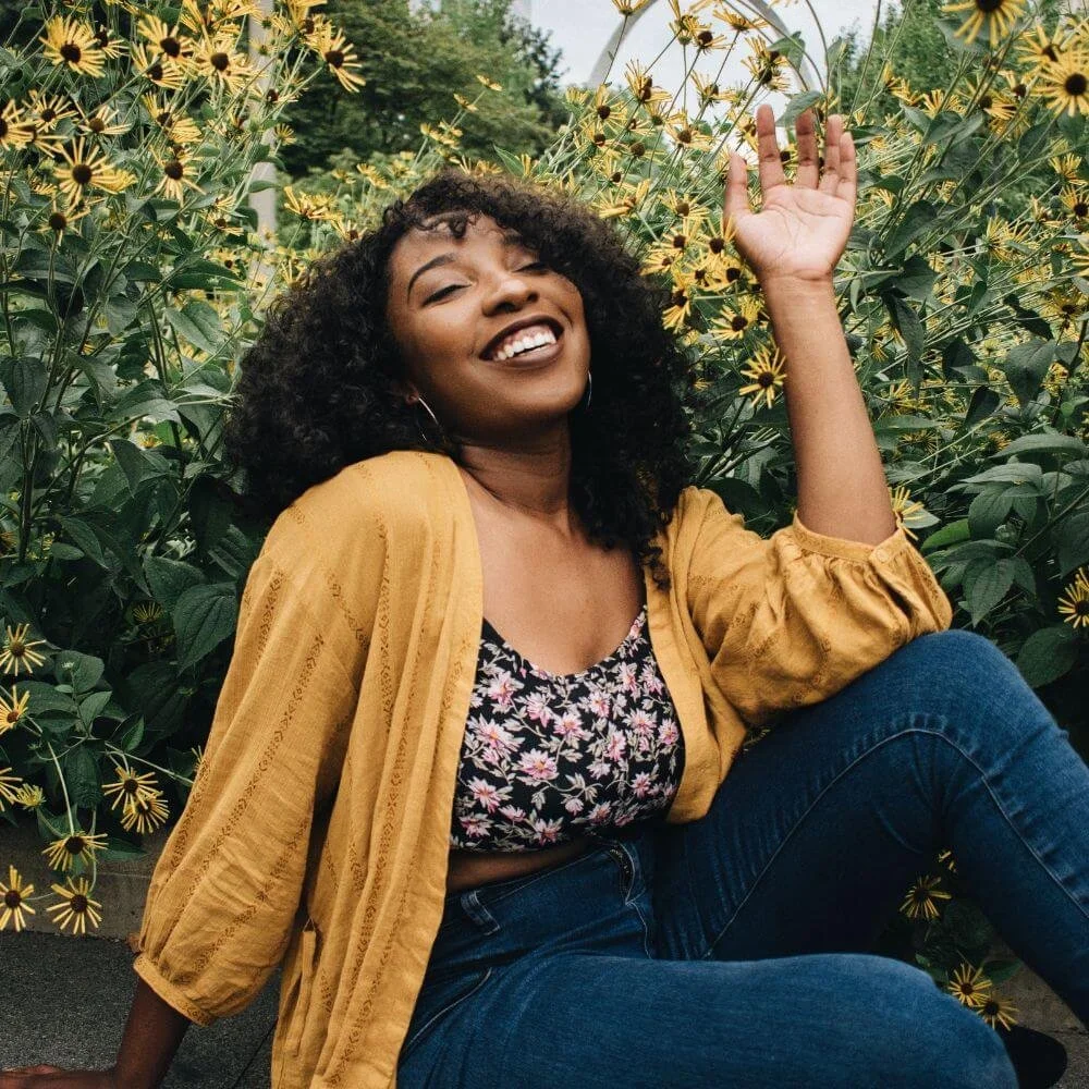 A woman who is smiling and happy.