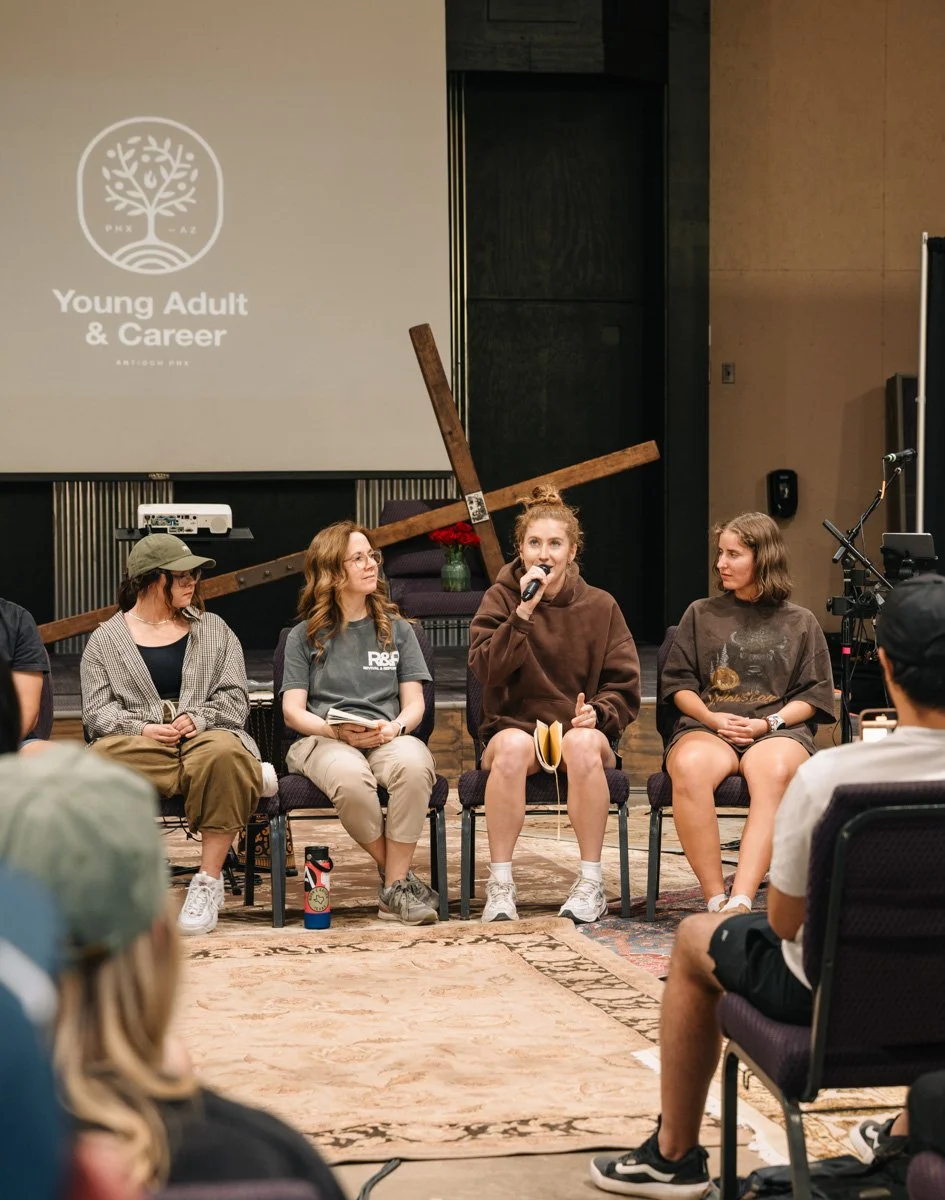 Young Adult and Career members giving testimony at monthly Abide service.