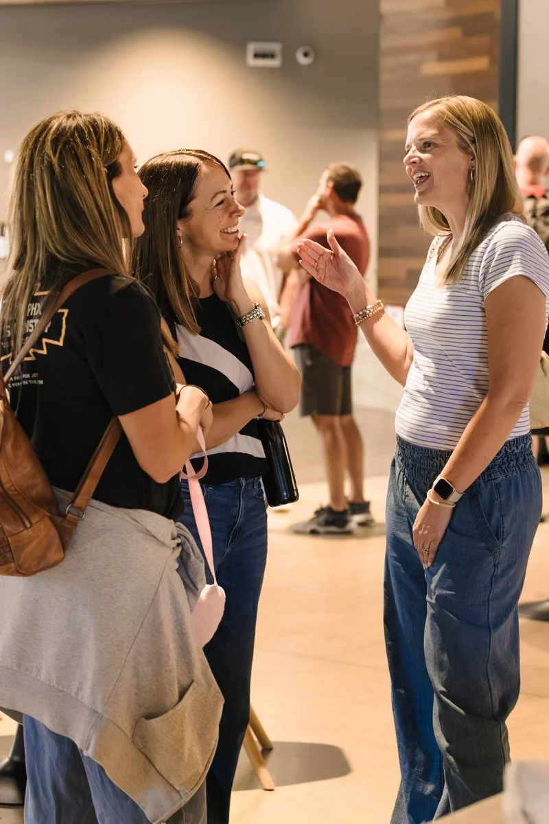 Women gathered together after a Sunday morning worship service at Antioch Community Church in Chandler Dobson Campus