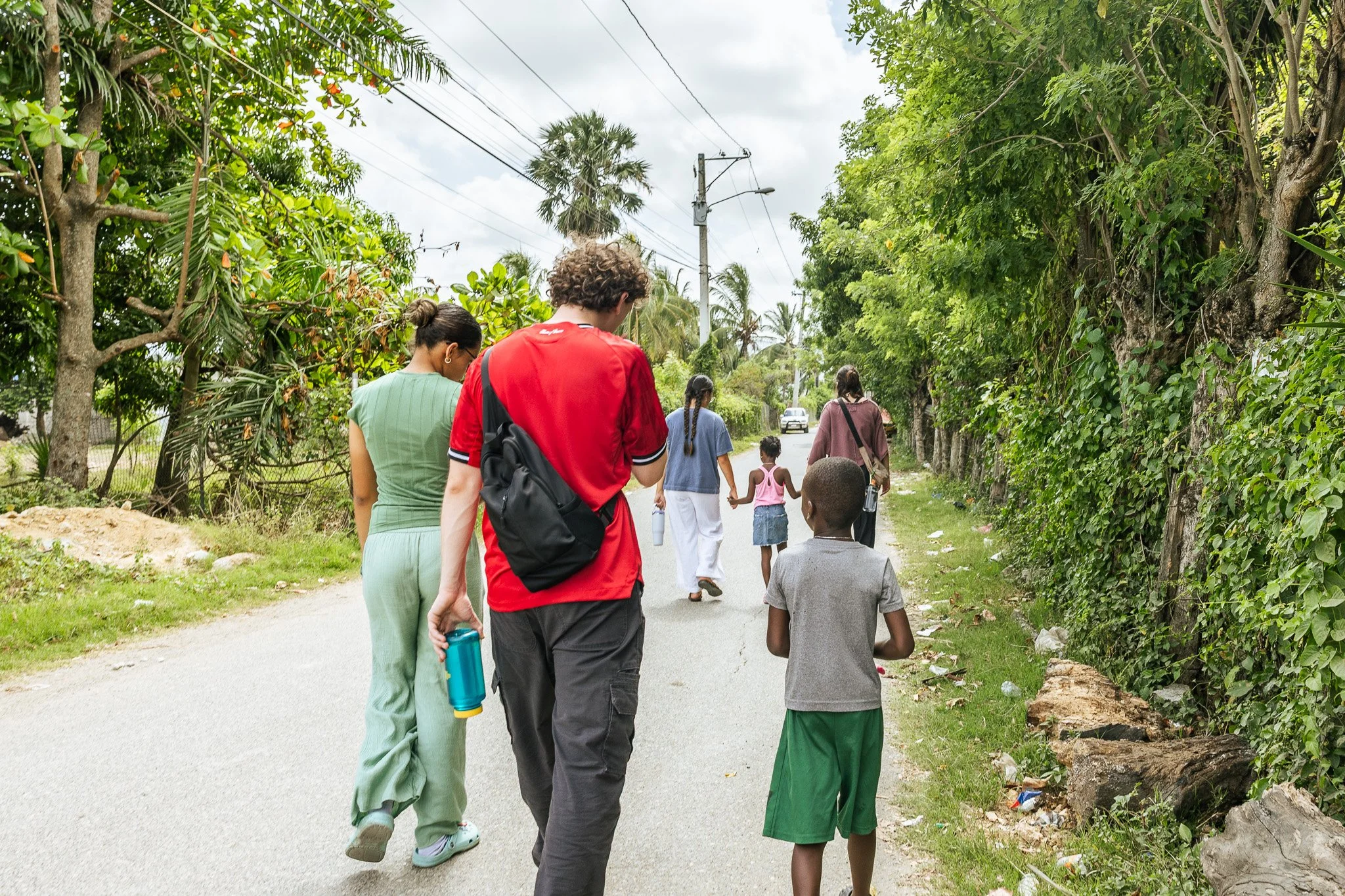 A group from Antioch Community Church walking while doing outreach.