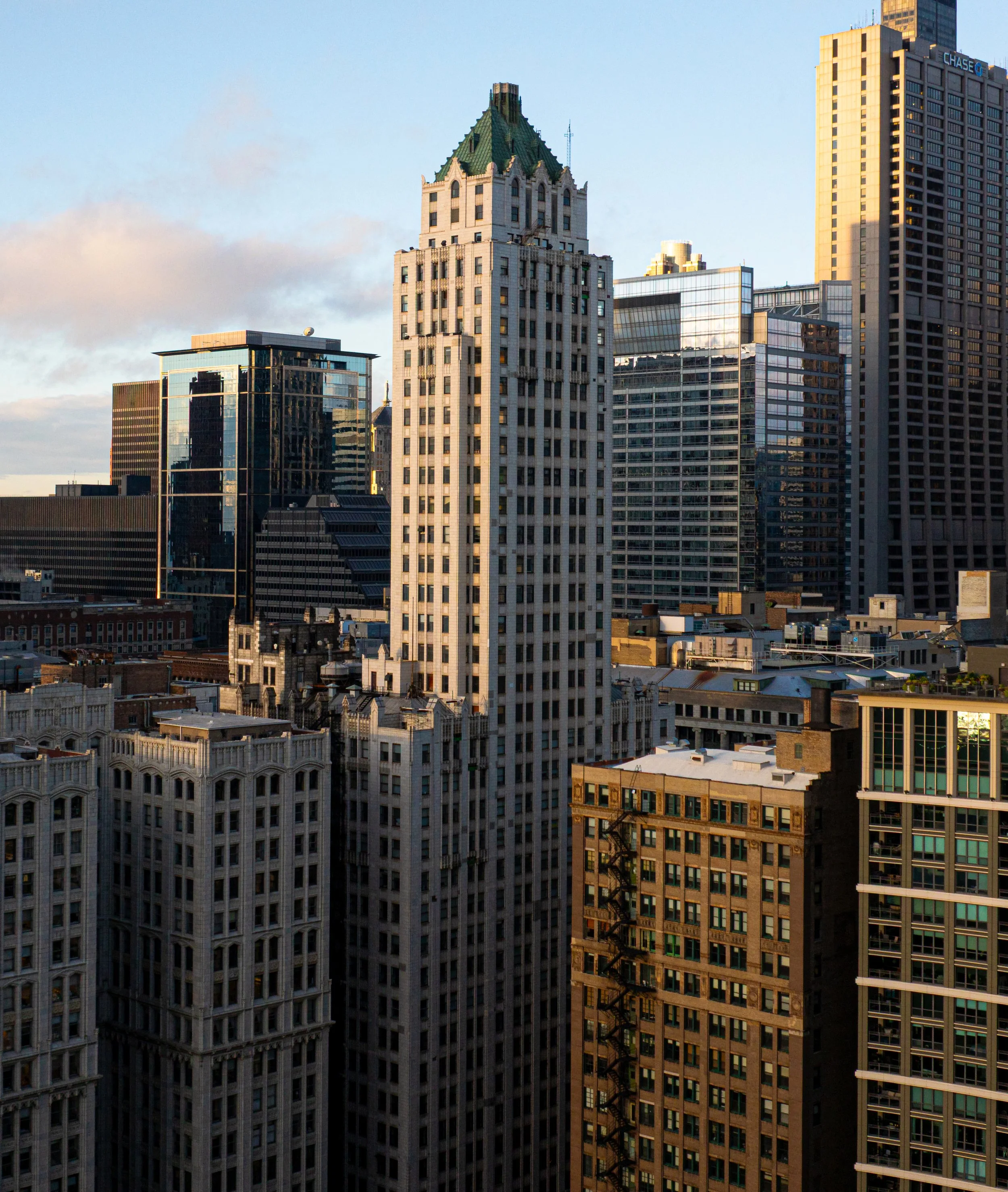 Historic Pittsfield Building in downtown Chicago, photographed among the surrounding Loop skyline.