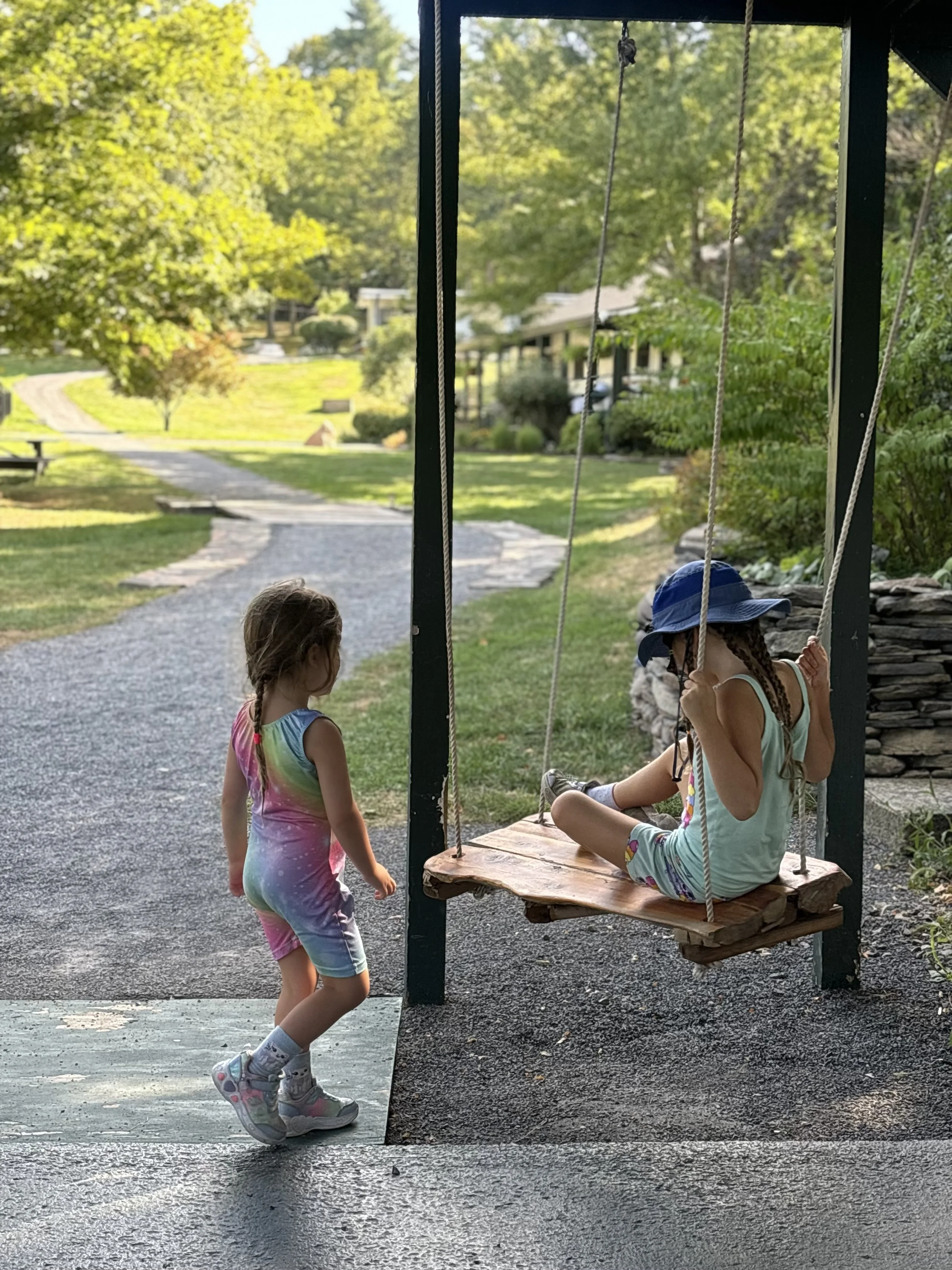 (B) This is a photo I took of my nieces while on a recent trip in upstate NY. I appreciated the simplify of it/them in this moment: what they weren't doing. They weren't asking for mom’s iPad or playing a game in the backseat of the car. They were ju