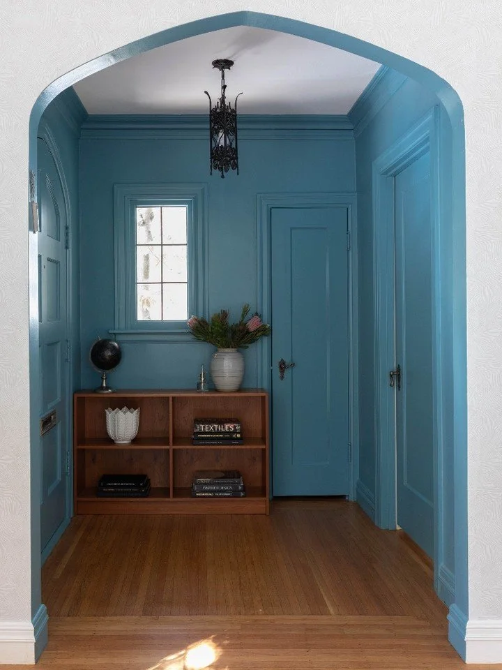 Quick weekend upgrade idea &rarr; repaint your entryway! ✨ We color-drenched this foyer in a bold blue, and the impact is instant. Sometimes all it takes is a fresh coat of paint to completely transform the mood of your home. Would you go bold in you