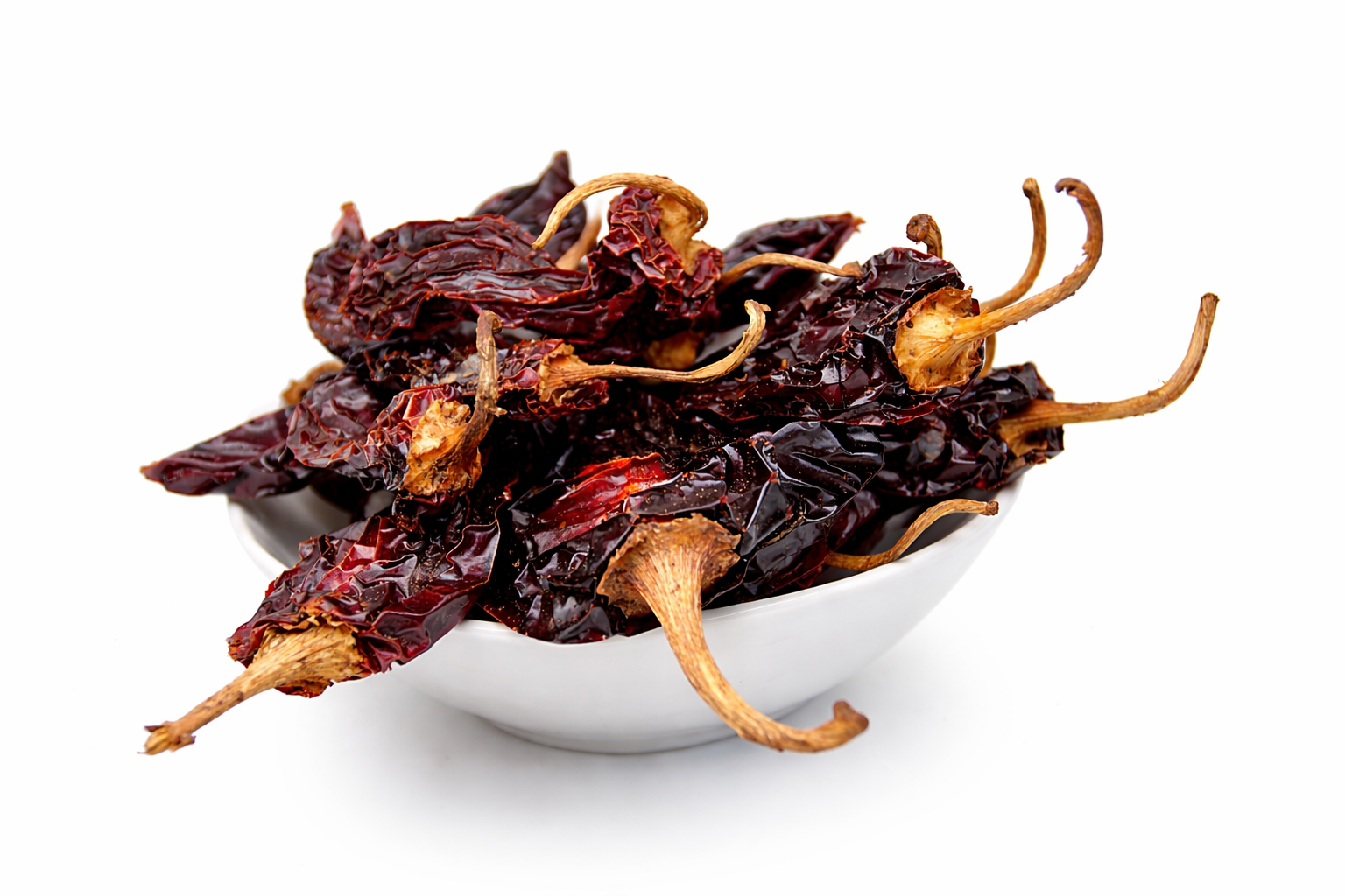 Dried red chilies in a bowl (1).png