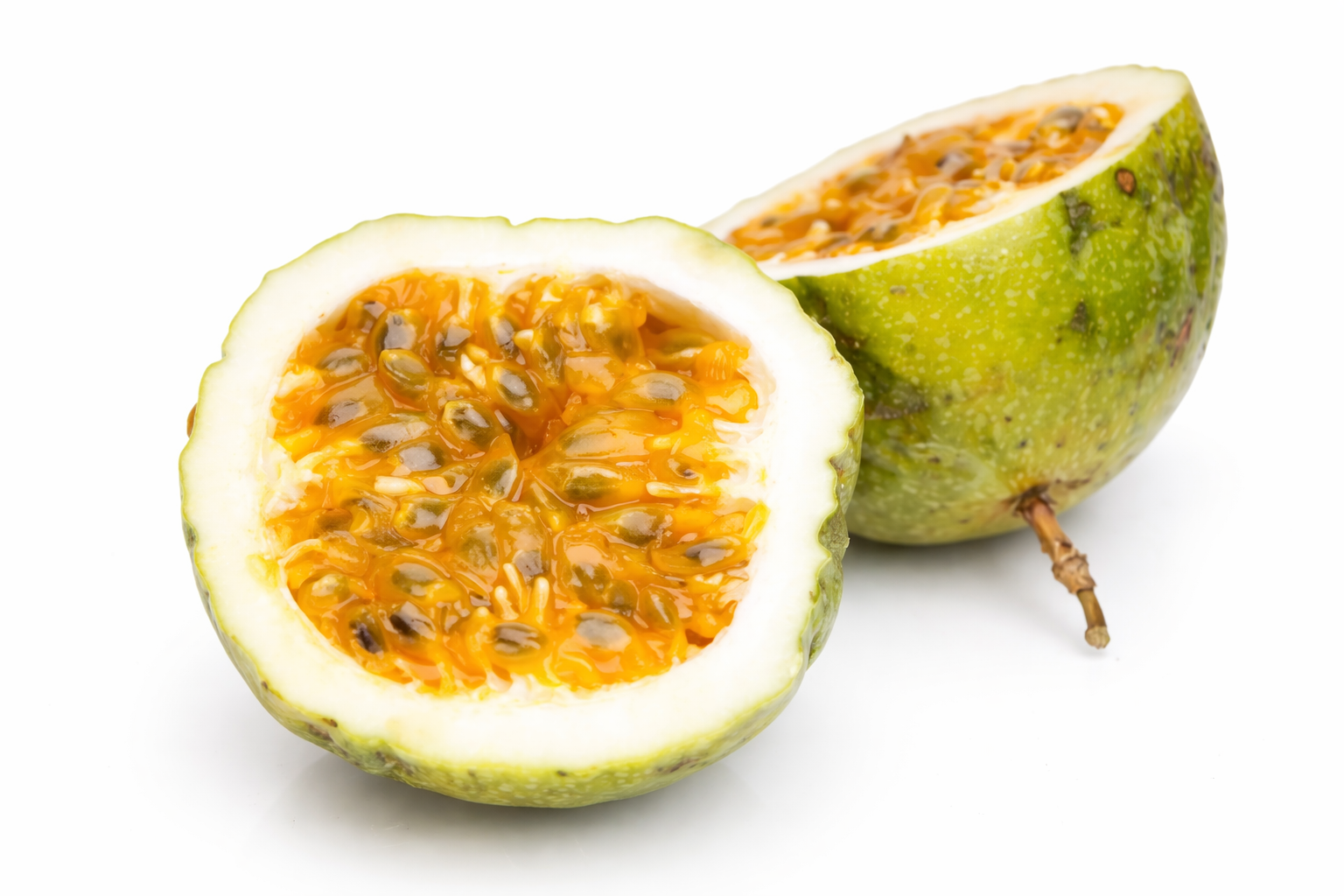 Fresh passion fruit halves close-up.png