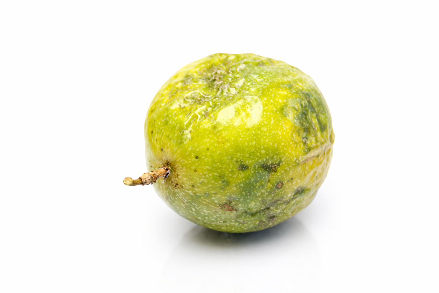 Ripe passion fruit close-up shot.png