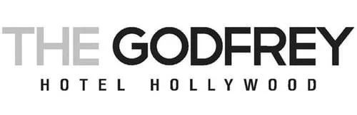 Logo for The Godfrey Hotel Hollywood with text in black and gray.